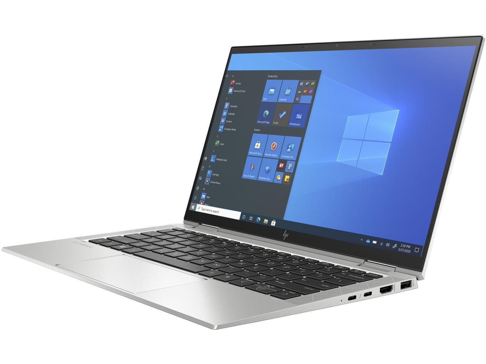 Ein silberner Laptop, der geöffnet ist und Windows zeigt. Der Bildschirm zeigt ein blaues Fensterdesign.