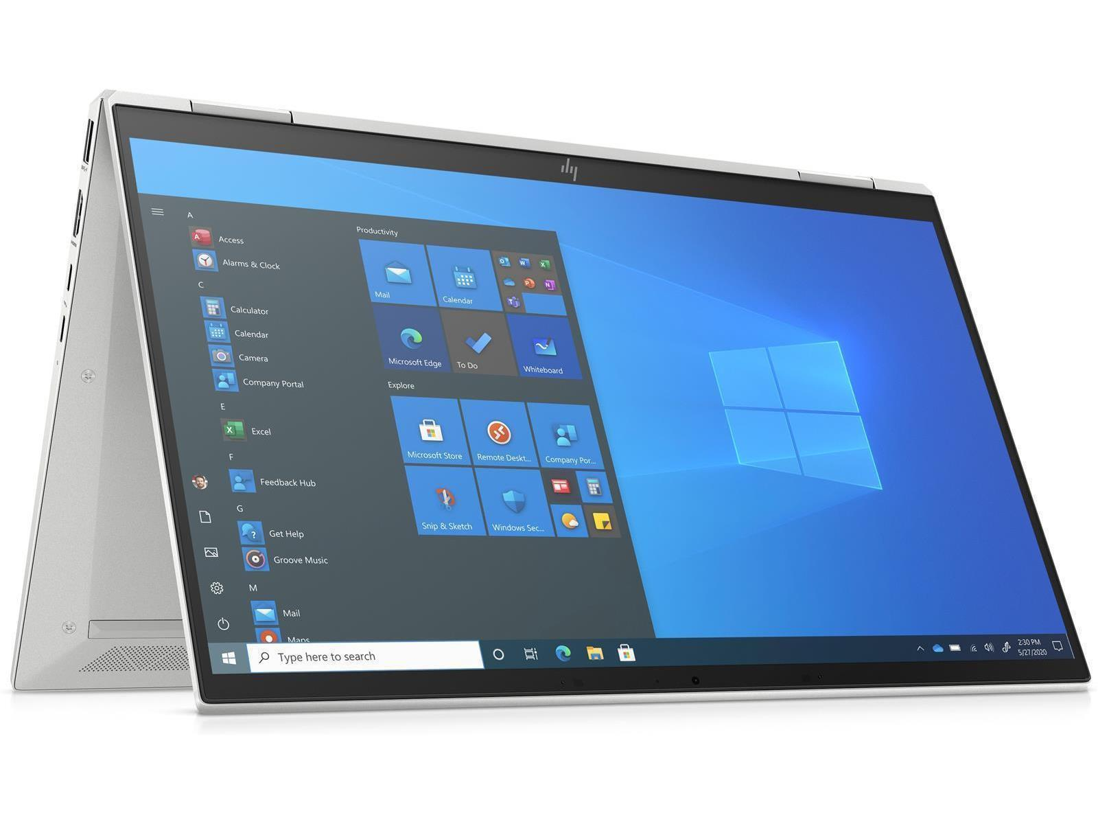 Silberner Laptop geöffnet, zeigt Windows-Desktop. Tastatur sichtbar. Weißer Hintergrund.