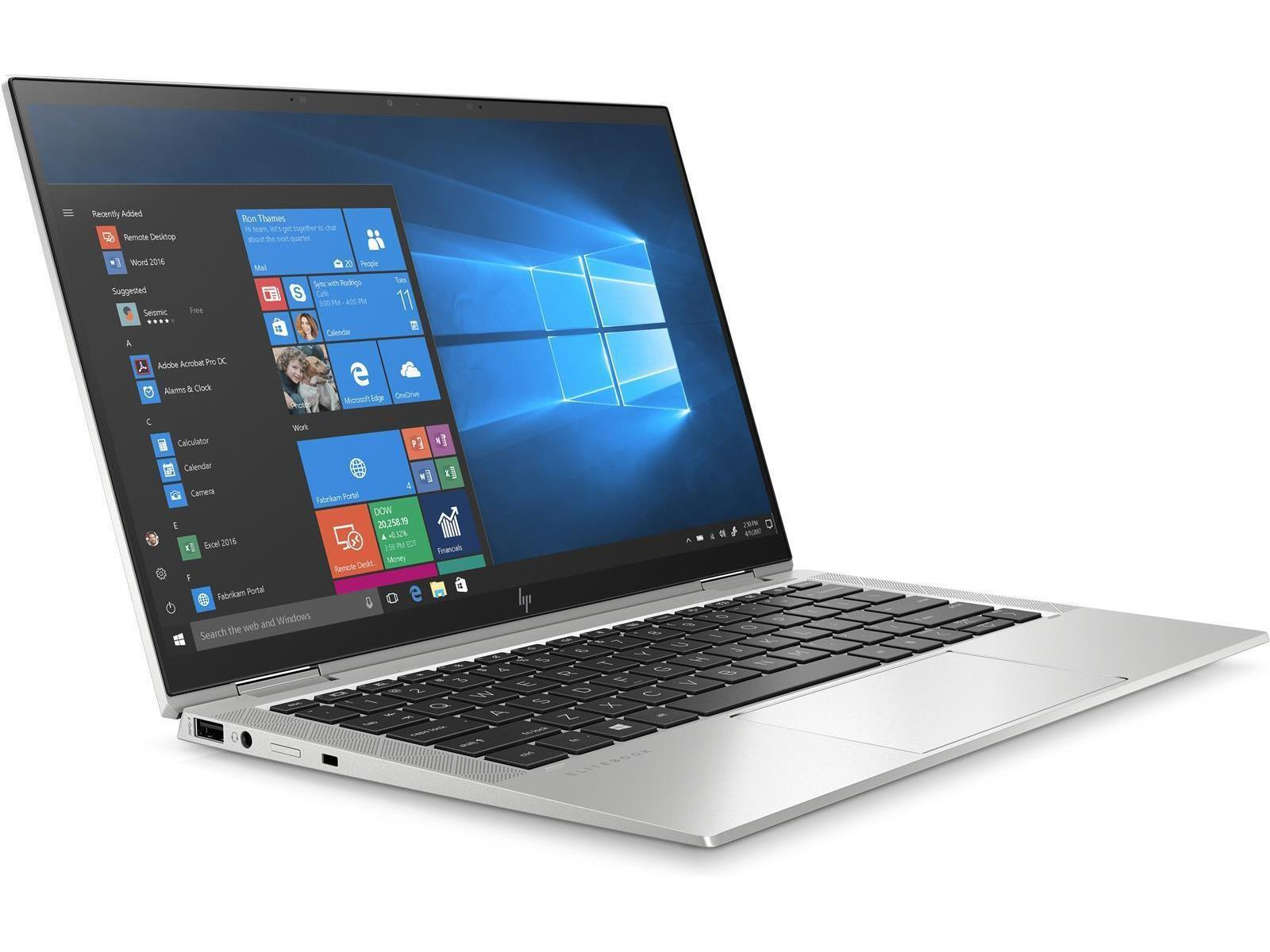 Ein silberner Laptop, der geöffnet ist und Windows zeigt. Der Bildschirm zeigt ein blaues Fensterdesign.