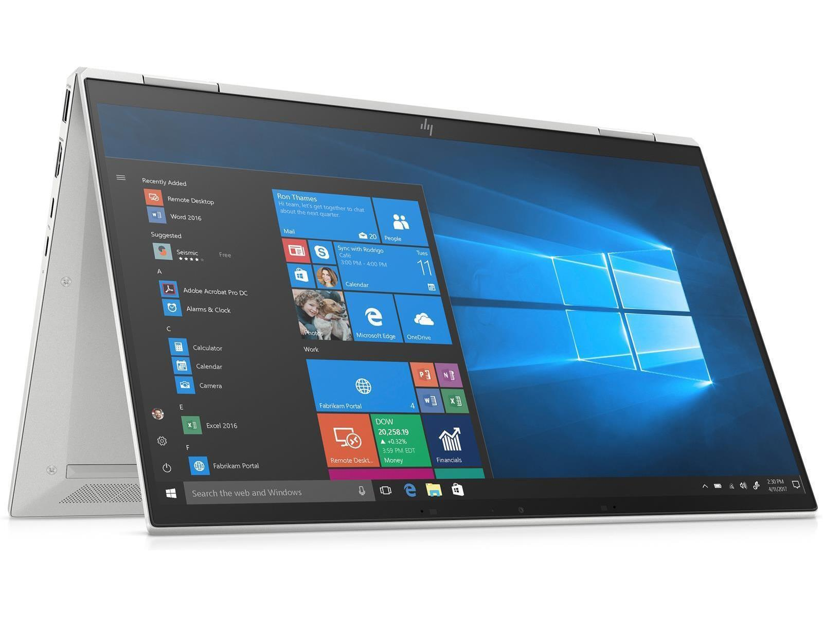 Laptop mit Windows-Oberfläche, geöffnet und angewinkelt. Der Bildschirm zeigt mehrere Anwendungsfenster.