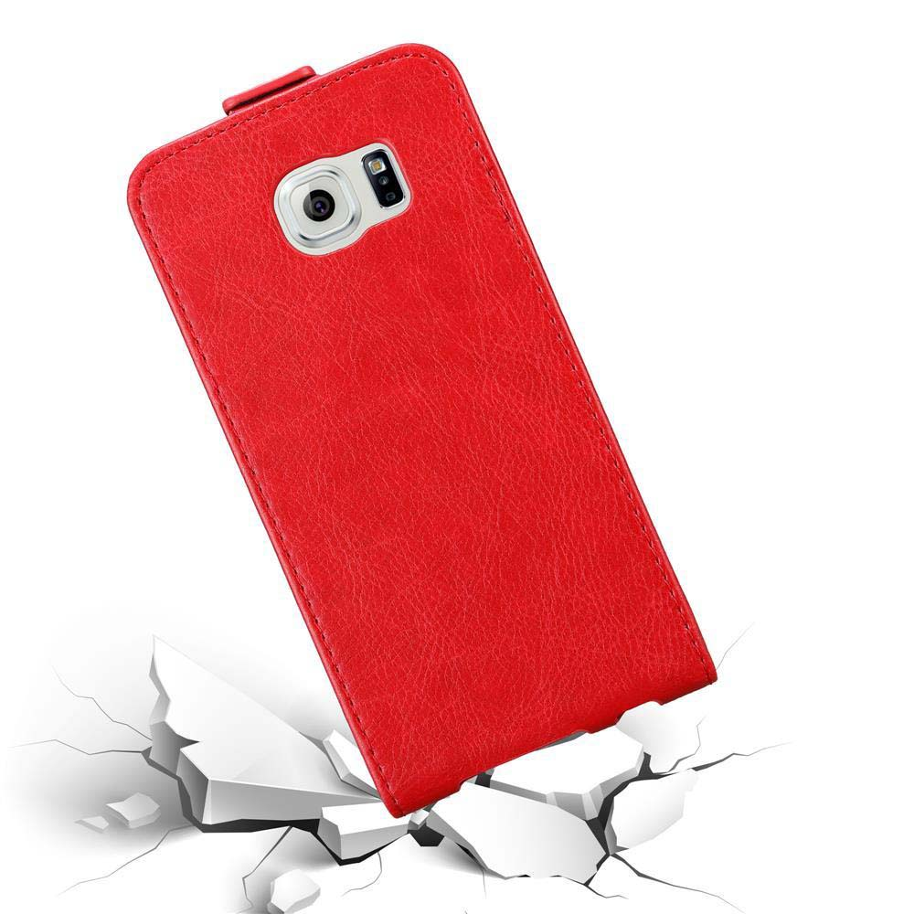 Rote Handyhülle geneigt mit Telefon darin, auf rissigem Boden. Die Hülle ist für ein Telefon.