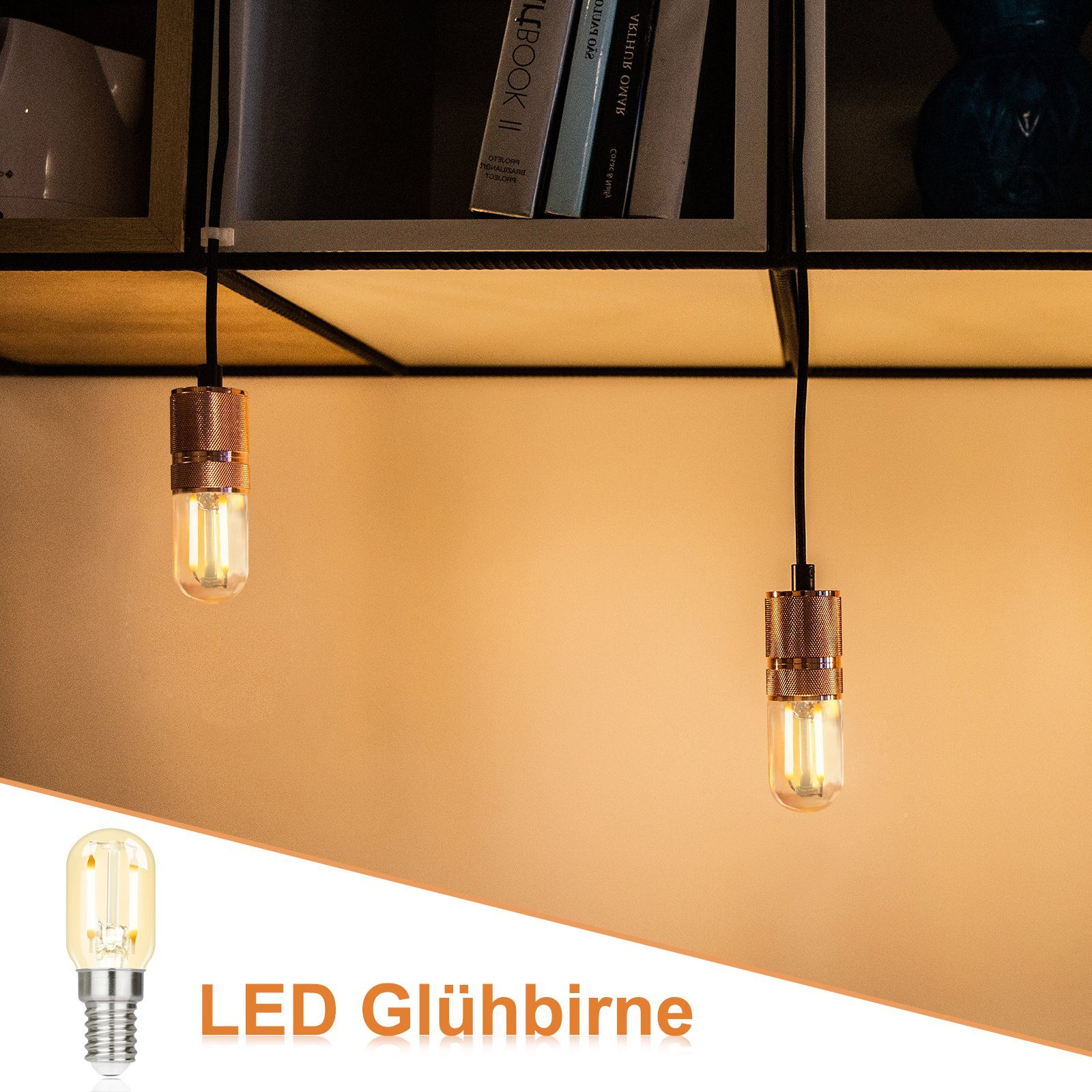 Dwie lampy wiszące z cylindrycznymi miedzianymi osłonami i przezroczystymi żarówkami, wiszące na przewodach.