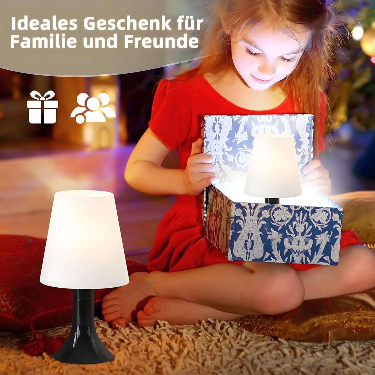 Dziewczynka otwiera pudełko z prezentem z zapaloną lampą w środku. Tekst mówi: 'Idealny prezent dla rodziny i przyjaciół'.