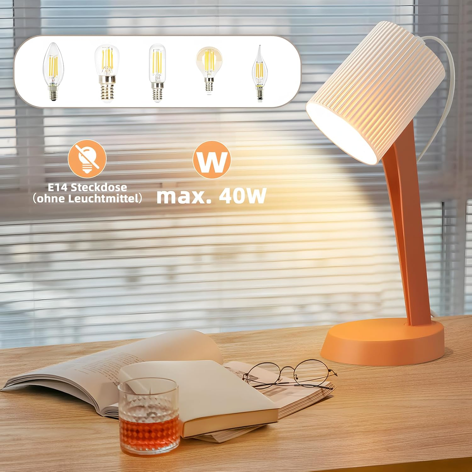 Lampa biurkowa o białym i pomarańczowym wzornictwie, oświetlająca biurko. Lampa ma żarówkę i jest ustawiona pod kątem z ikonami.