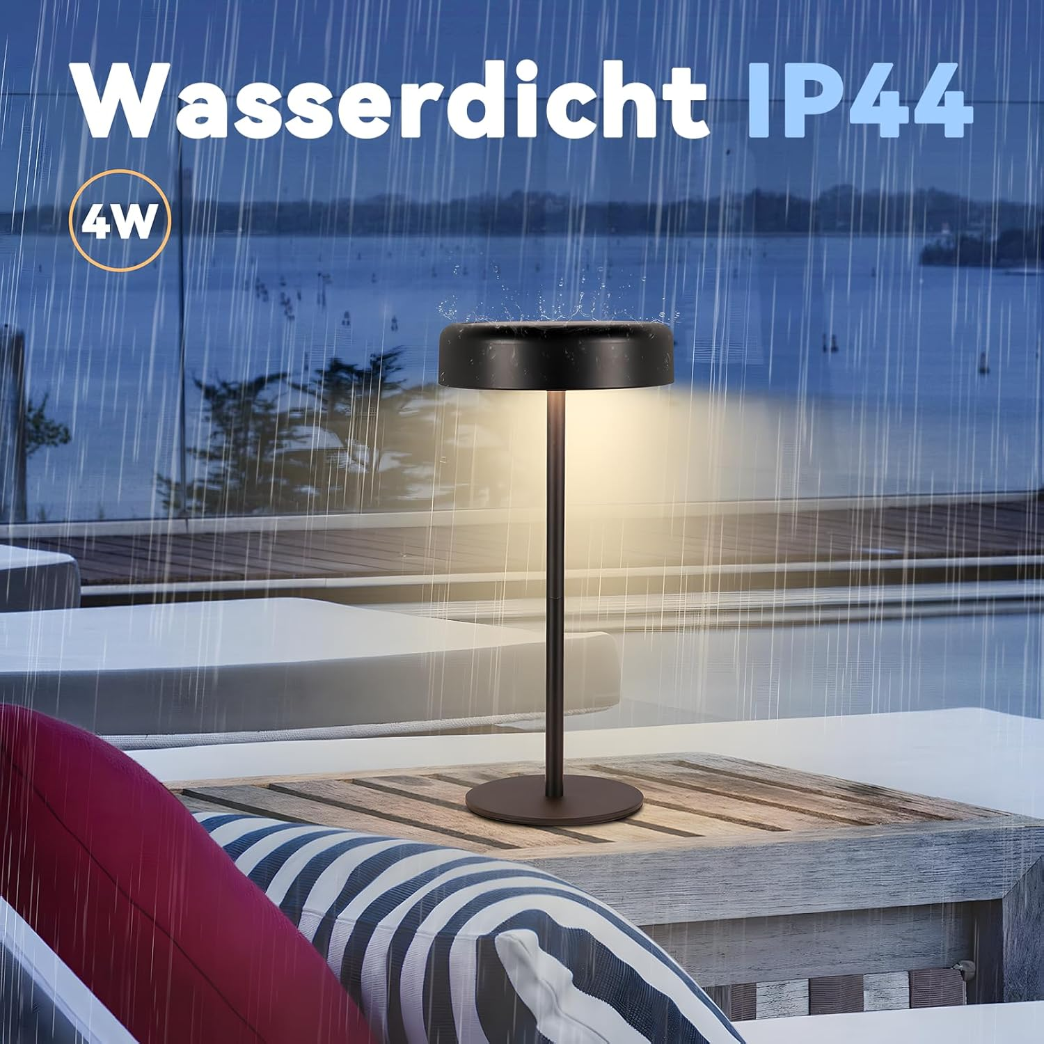 Czarna lampa na drewnianym stole, z deszczem w tle. Lampa jest wodoodporna IP44.