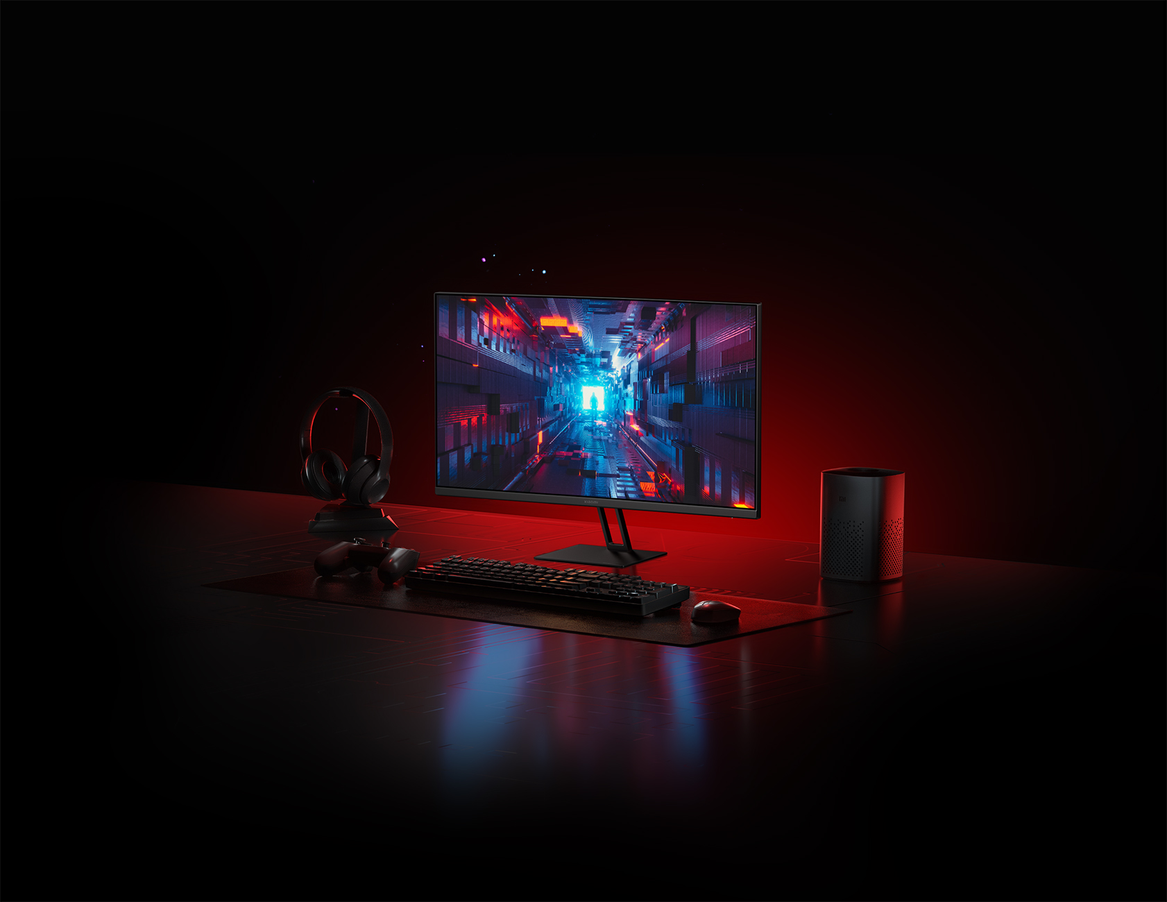 Konfiguracja do gier z monitorem, klawiaturą, słuchawkami, myszą i innymi akcesoriami. Tło jest ciemne.