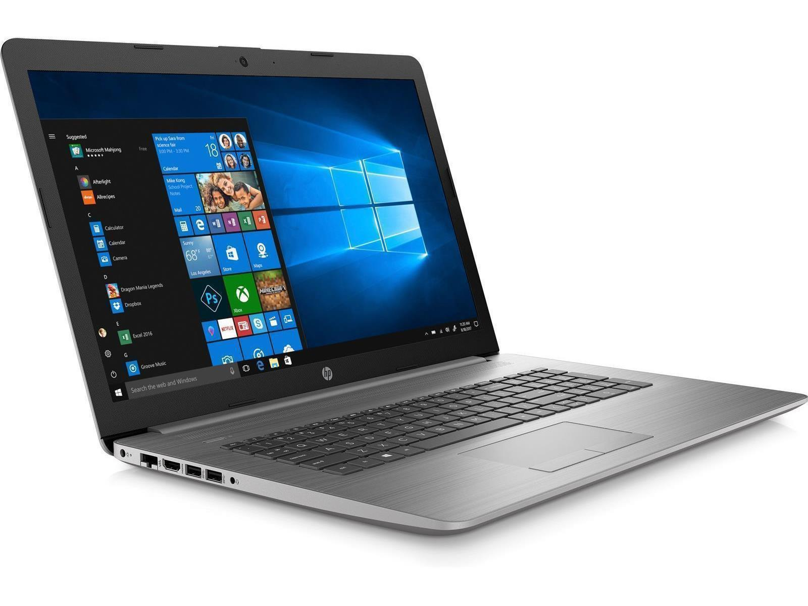 Ein silberner Laptop ist geöffnet und zeigt eine Windows-Oberfläche. Der Bildschirm zeigt verschiedene App-Symbole und Fenster.