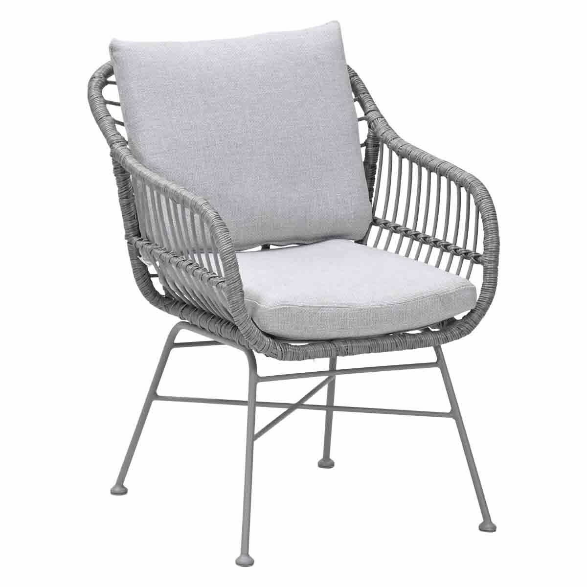 Gray woven chair with cushion and pillow. It has metal legs and is on a white background.