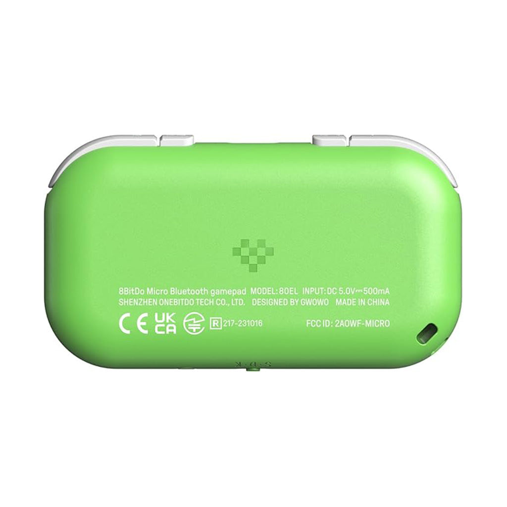 Tył zielonego gamepada z informacjami o produkcie i certyfikatami.