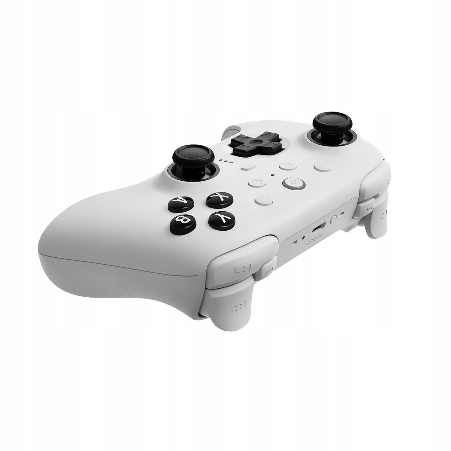 Biały gamepad na białym tle. Ma czarne przyciski i dwa joysticki. Design jest elegancki.