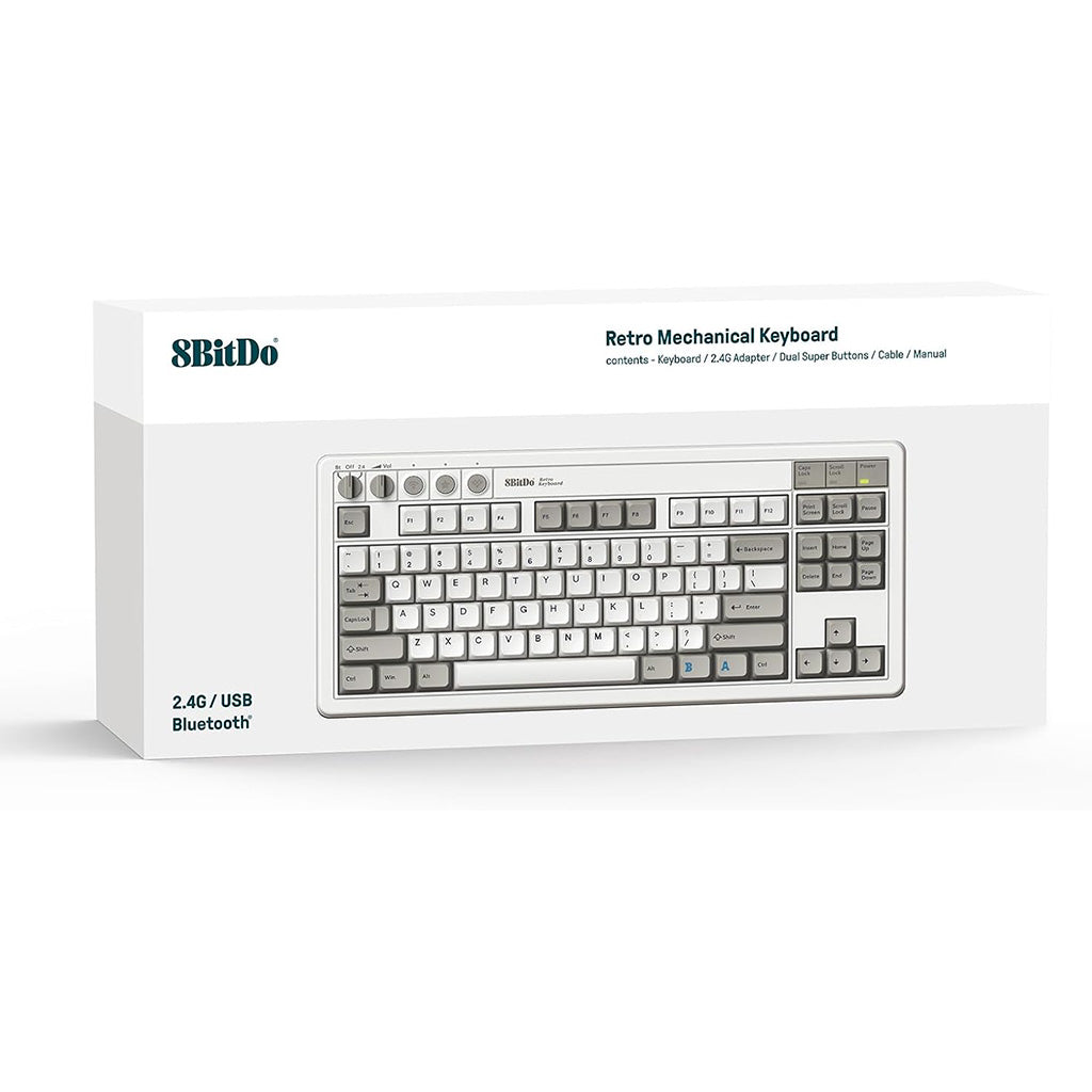 Białe pudełko z klawiaturą w środku. Na pudełku znajdują się słowa 'Retro Mechanical Keyboard'.