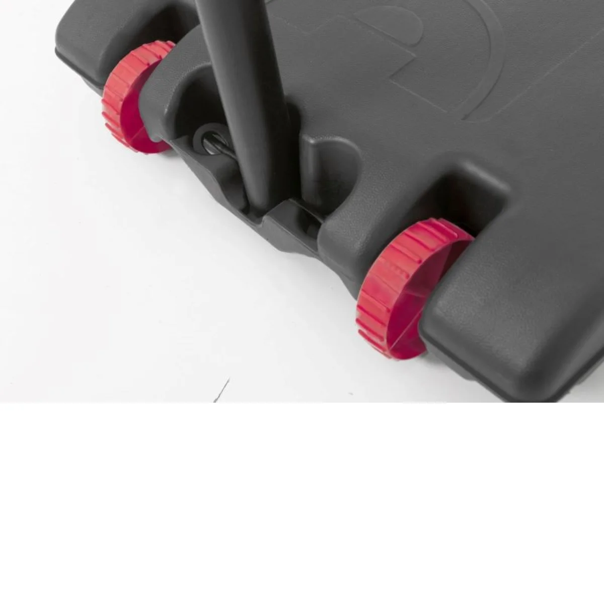 Close-up of the base of a basketball hoop. Black plastic base with red wheels.