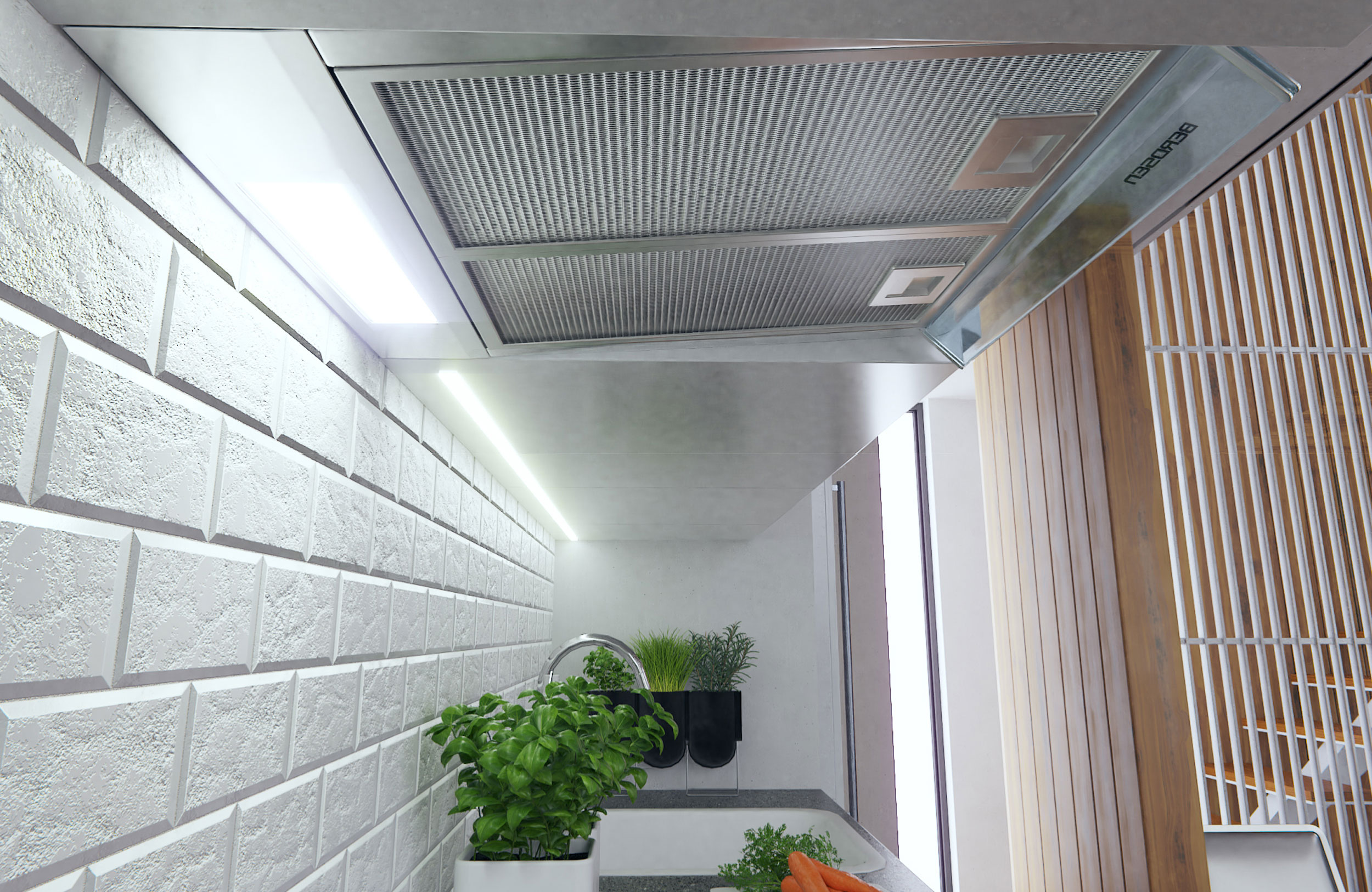 Scena kuchenna z okapem BERDSEN nad zlewem i blatem.