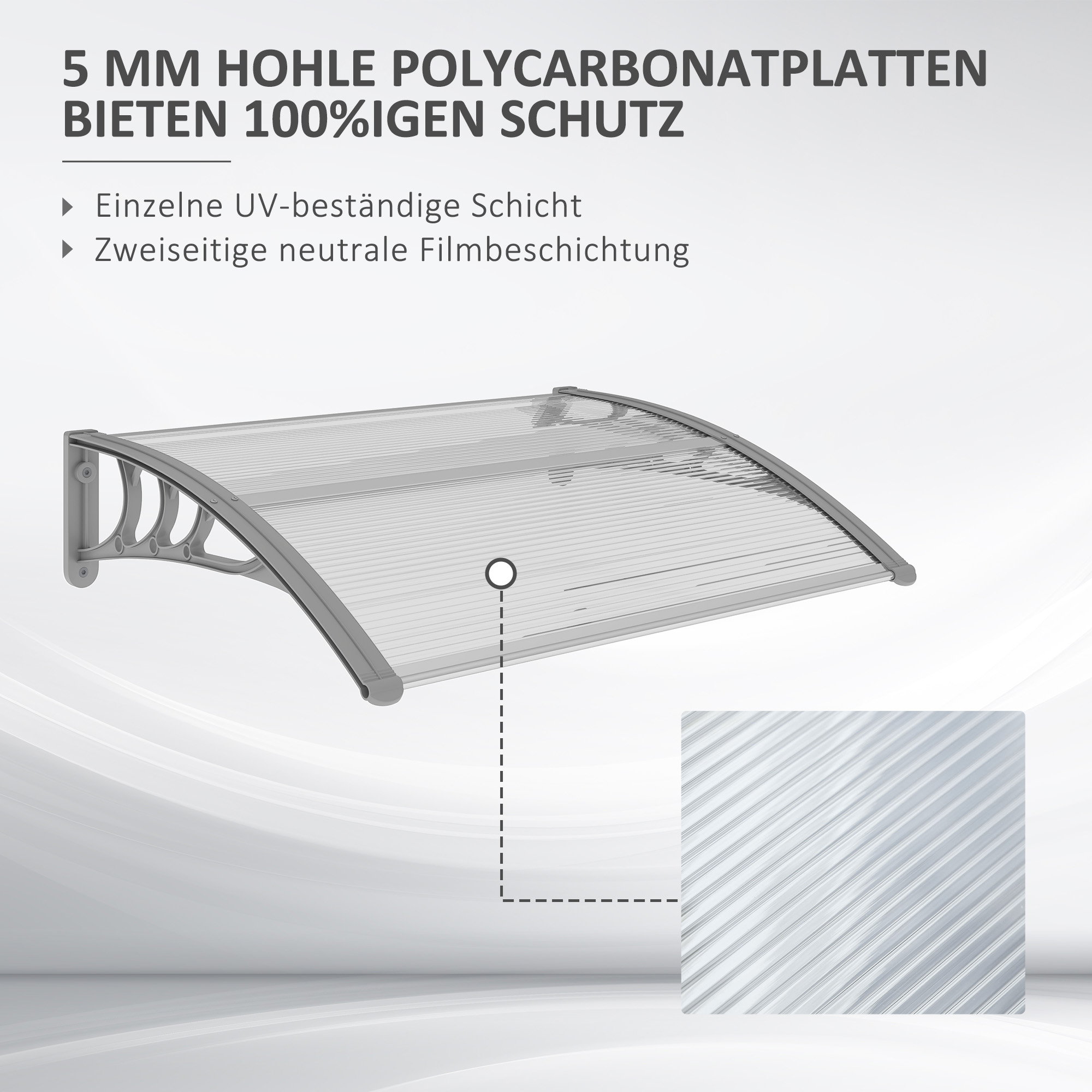 Eine transparente Polycarbonat-Markise mit grauem Rahmen, montiert an einer weißen Wand.