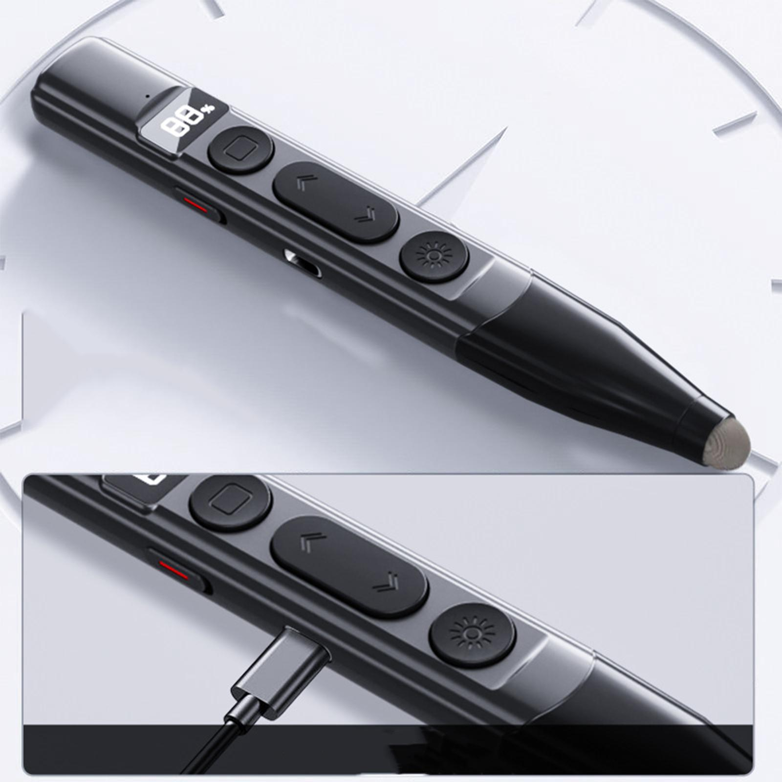 Ein schwarzer Präsentationsstift liegt auf einer weißen Oberfläche. Er hat Knöpfe und einen LCD-Bildschirm. Nahaufnahme.