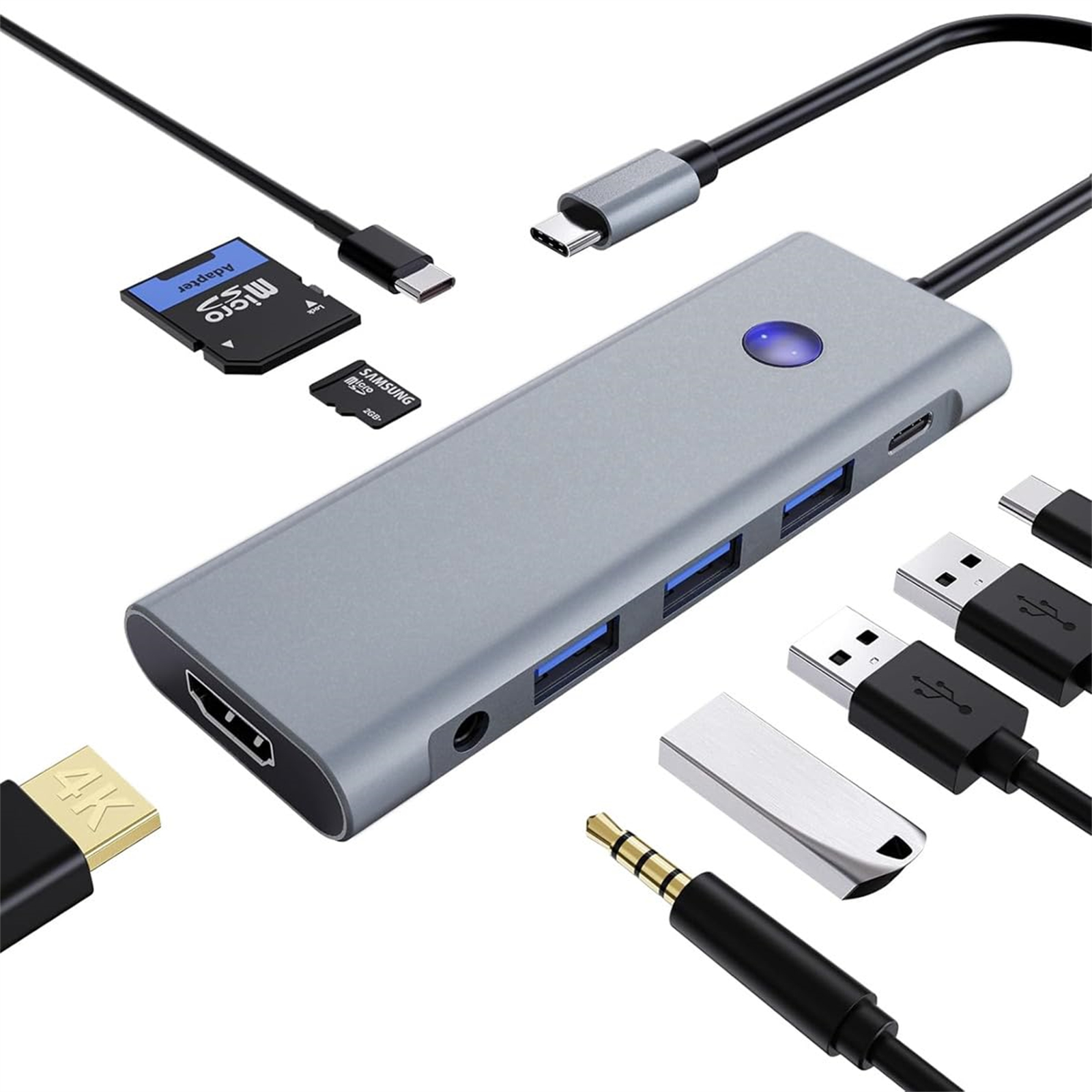 Ein silberner Hub mit mehreren Anschlüssen, der mit verschiedenen Geräten verbunden ist, einschließlich USBs und SD-Karten.