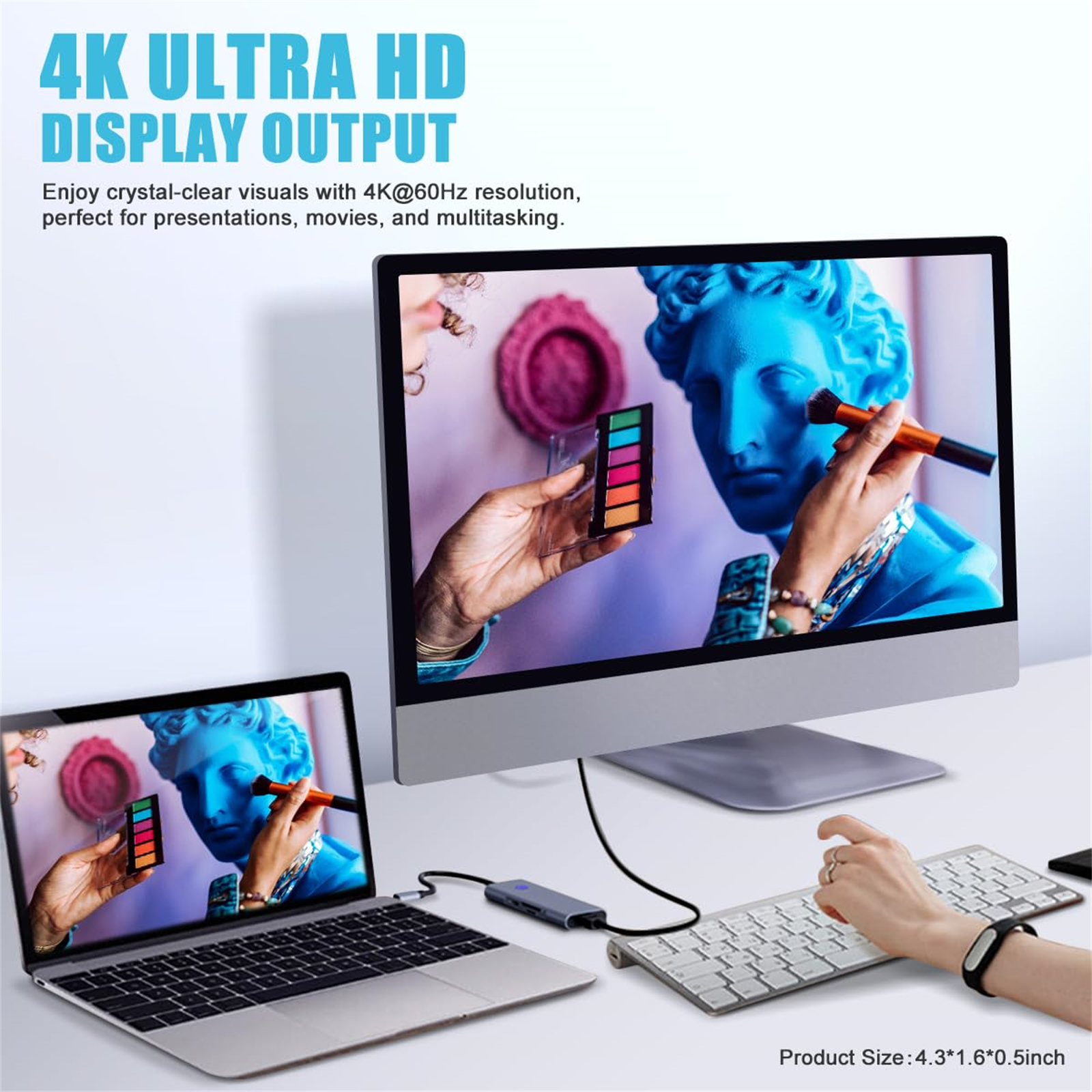 Laptop und Monitor mit Kunstwerken. Tastatur und Hub sind angeschlossen. Produktgröße: 4,3*1,6*0,5 Zoll.