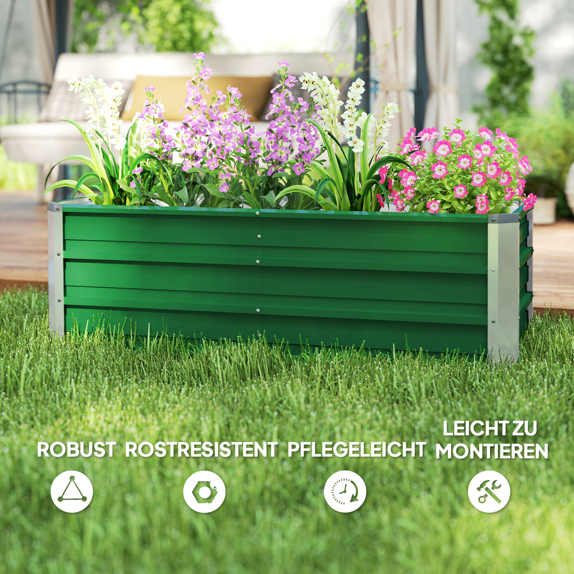 Grünes Metall-Hochbeet gefüllt mit bunten Blumen und Pflanzen auf grünem Gras.