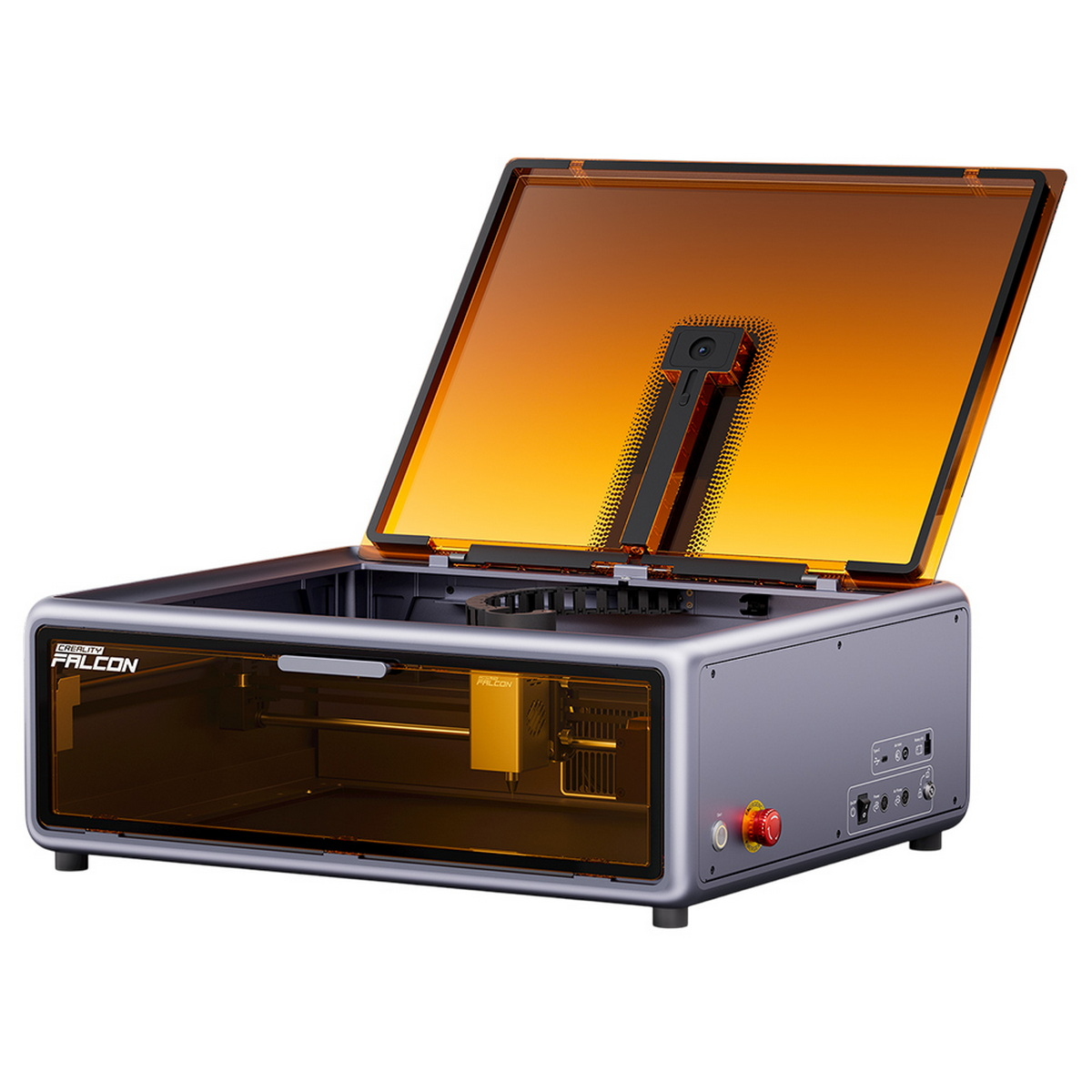 Macchina per incisione laser. Ha un corpo grigio, un coperchio trasparente colorato di arancione e comandi.