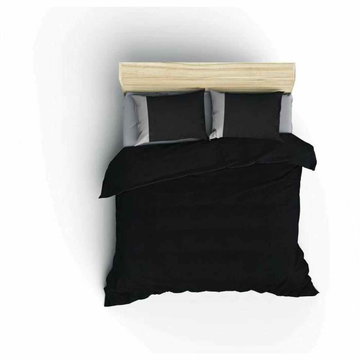 Ein Bett mit schwarzer Bettwäsche, zwei grauen Kissen. Das Bett ist vor weißem Hintergrund, von oben.