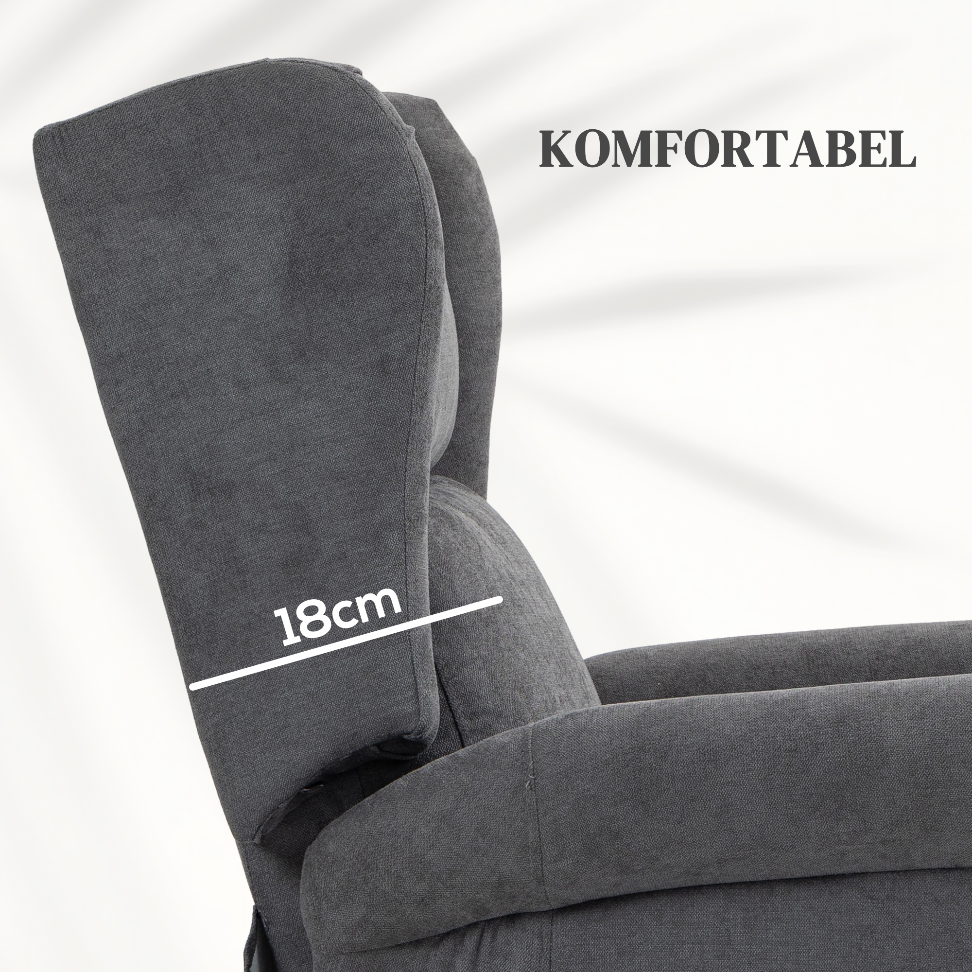 Nahaufnahme eines grauen Sessels, der die Kopfstütze mit dem Text 'KOMFORTABEL' zeigt.