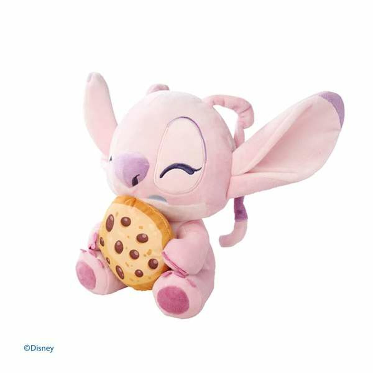 Un peluche rosa di Stitch che tiene un biscotto, con il logo Disney in basso.