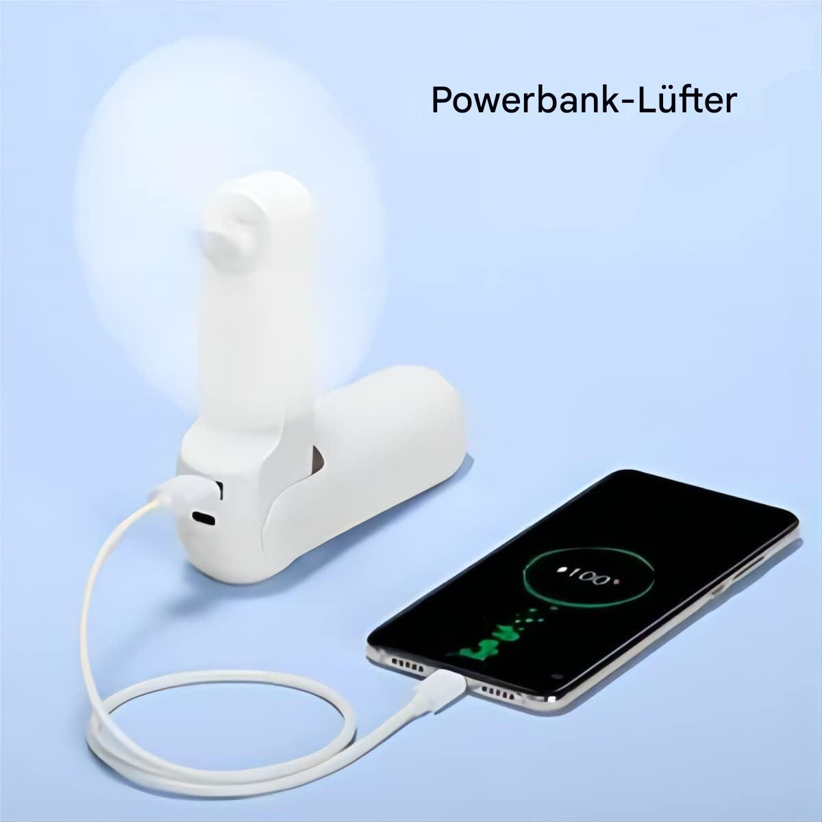 Ein weißer Ventilator lädt ein Telefon auf. Das Telefon zeigt 100% geladen an. Ein weißes Kabel ist eingesteckt.