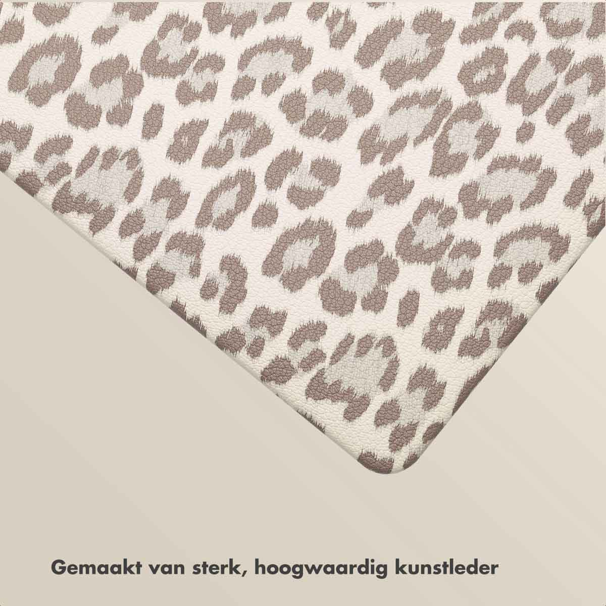Close-up of a corner of a leopard print pattern. The background is a light beige color. The text says 'Made of strong, high-quality faux leather'.