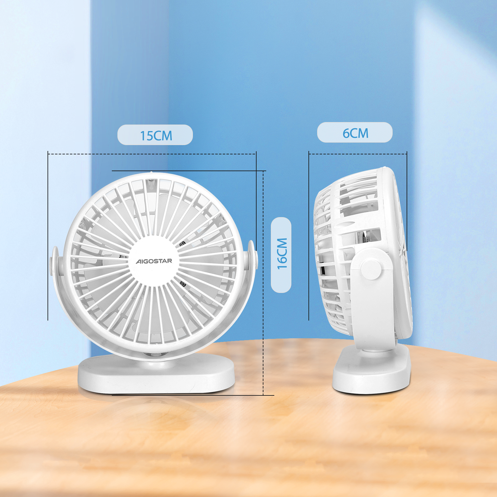 Ventilatore da tavolo bianco con dimensioni indicate. È su un tavolo di legno e sullo sfondo c'è un blu.
