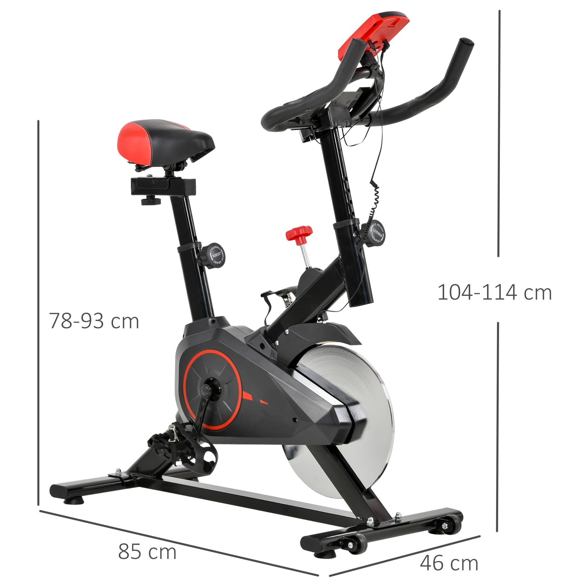 Ein Heimtrainer mit Abmessungen. Es hat ein schwarz-rotes Design.