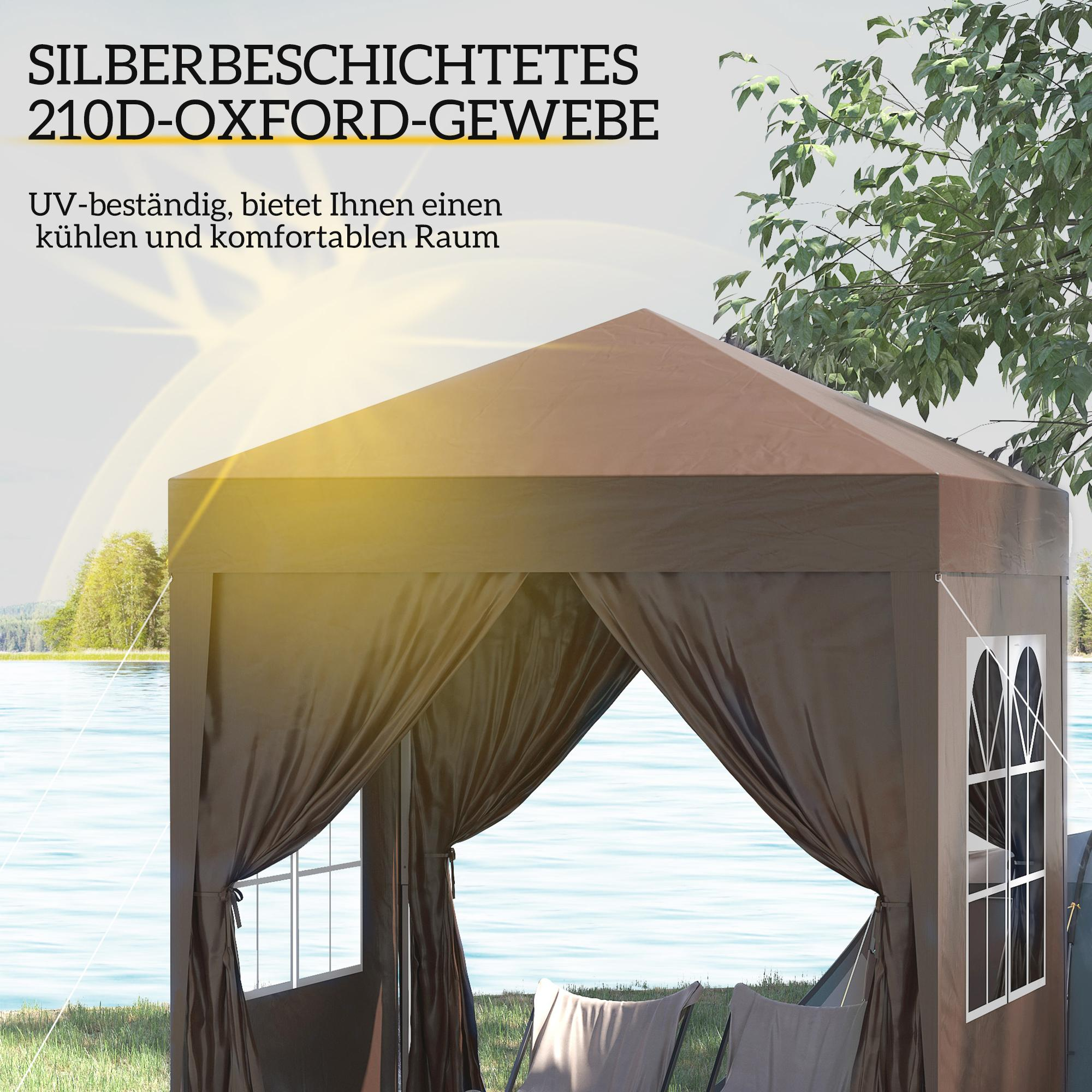 Ein brauner Pavillon in Wassernähe. Er hat Vorhänge und Fenster. Der Himmel ist hell und die Sonne scheint.