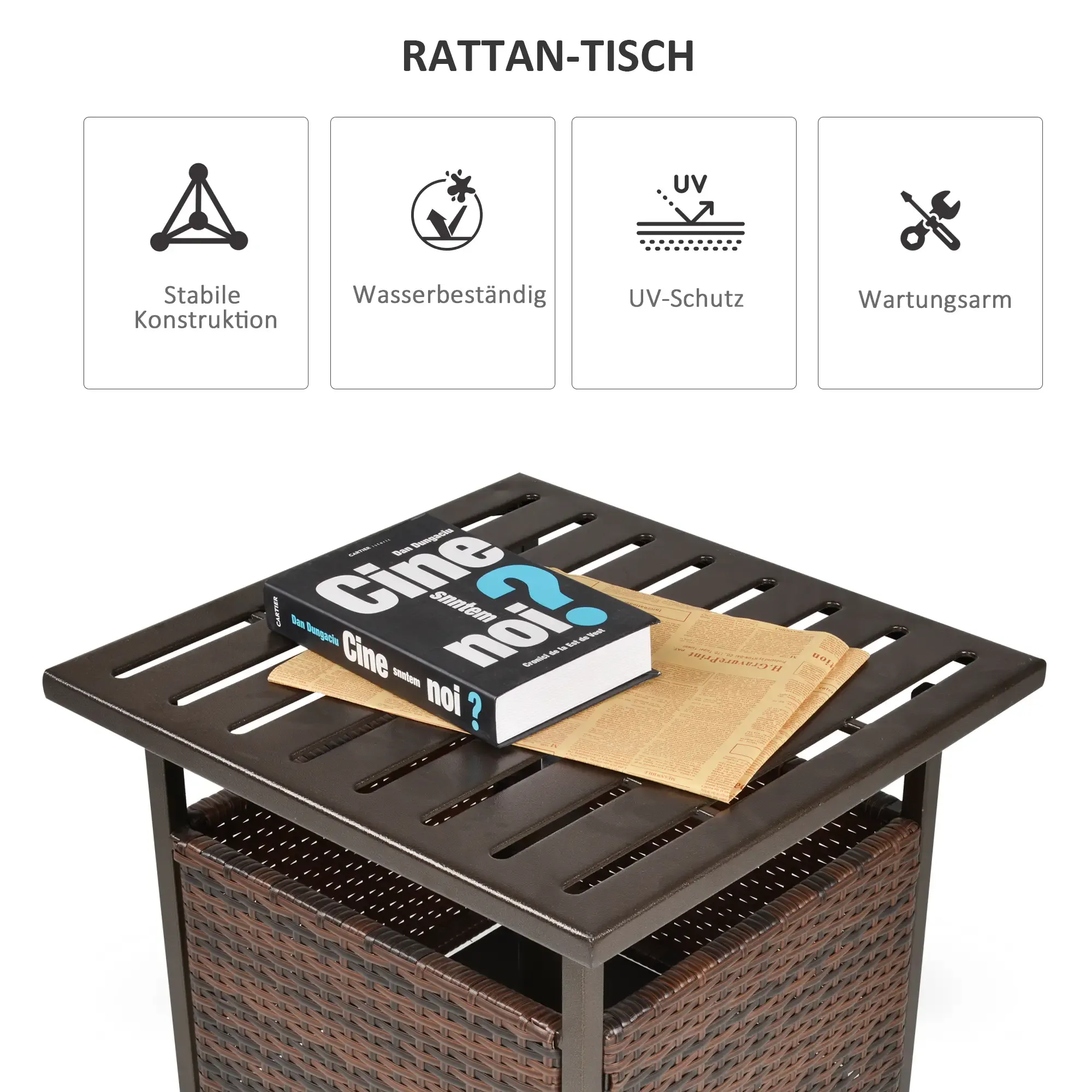 Rattantisch mit Buch und Papier. Merkmale: Wasserbeständigkeit und UV-Schutz.