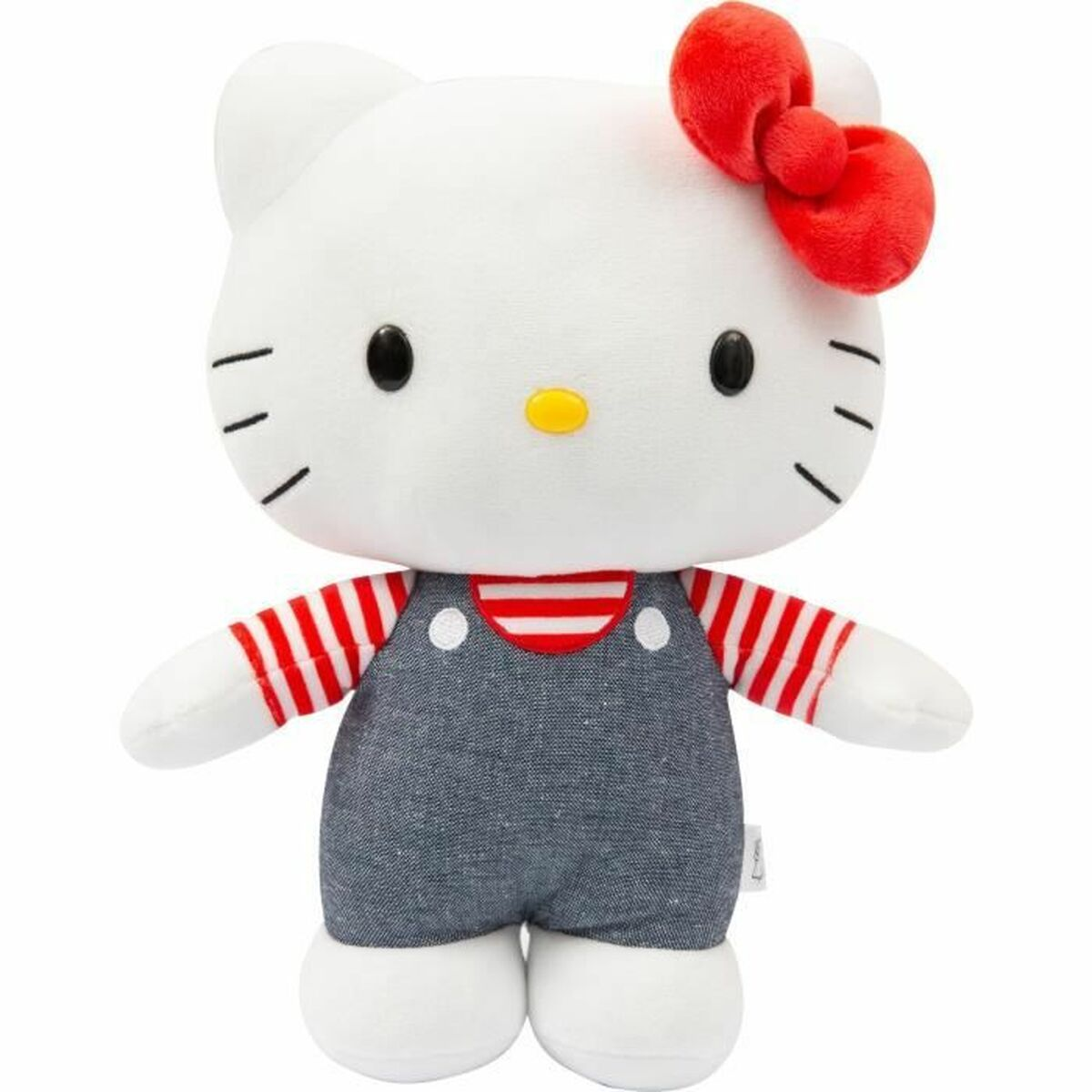 Weißes Hello Kitty-Plüschtier mit roter Schleife, trägt eine Jeans-Latzhose und ein rot-weiß gestreiftes Hemd.