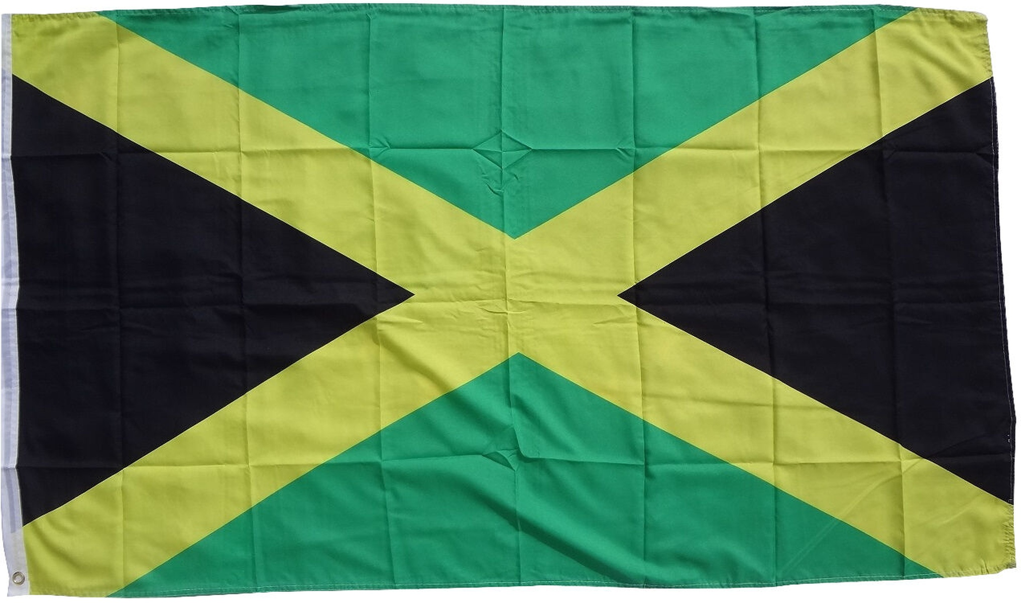 Die jamaikanische Flagge: ein gelbes Andreaskreuz auf grünem Feld, durch schwarze Dreiecke geteilt.