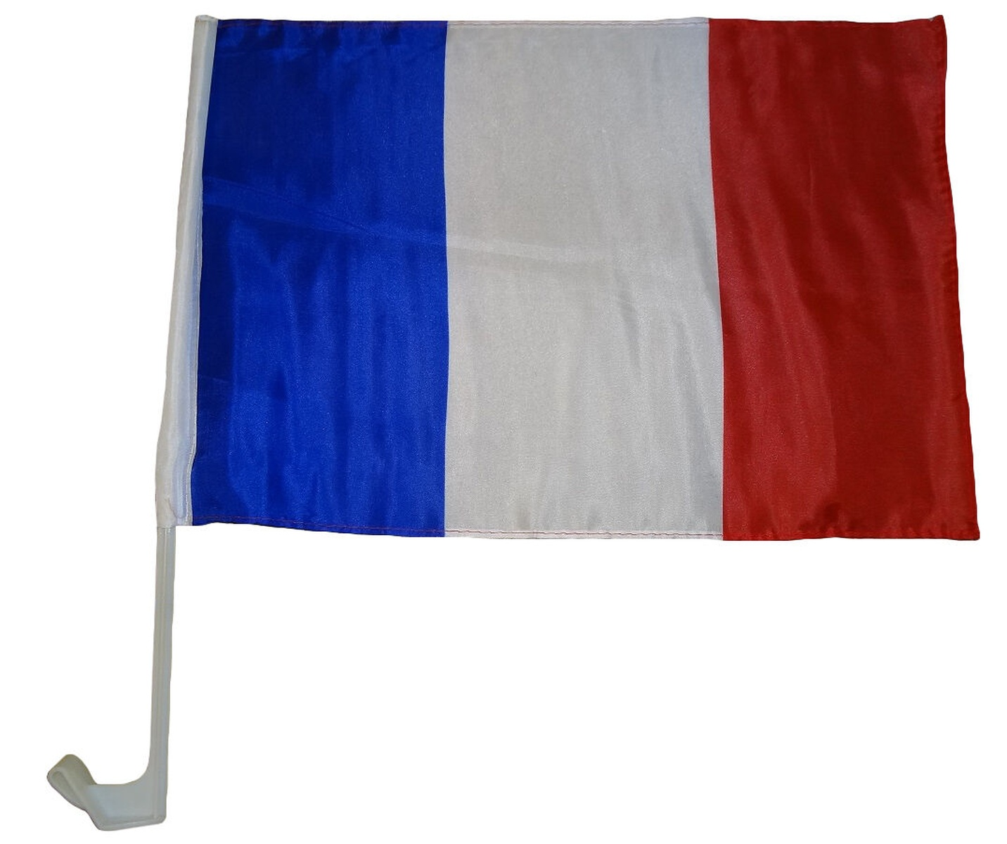 Eine kleine Flagge an einem weißen Mast mit blauen, weißen und roten vertikalen Streifen.