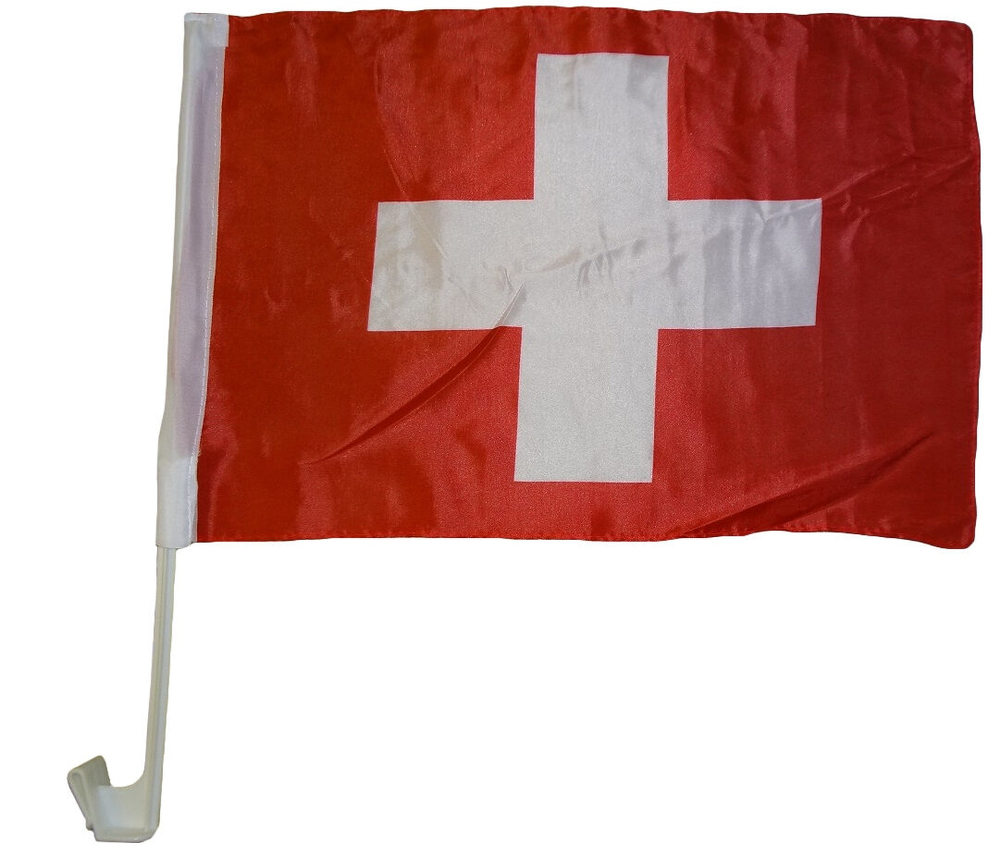 Schweizer Flagge: weißes Kreuz auf rotem Grund, an einer Stange befestigt.