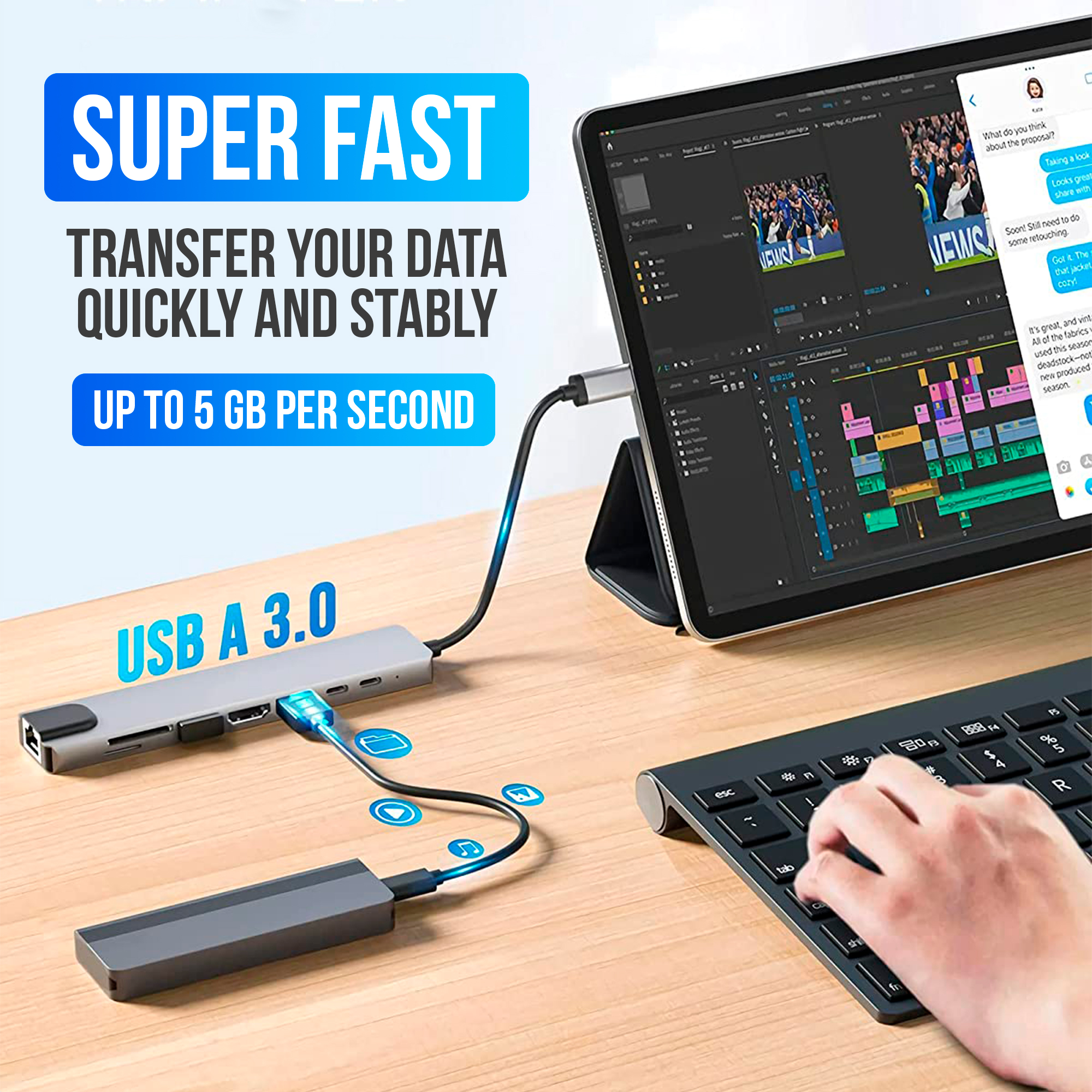 Hub USB-C connecté à une tablette, clavier au premier plan. Transfert de données jusqu'à 5 Go/s.