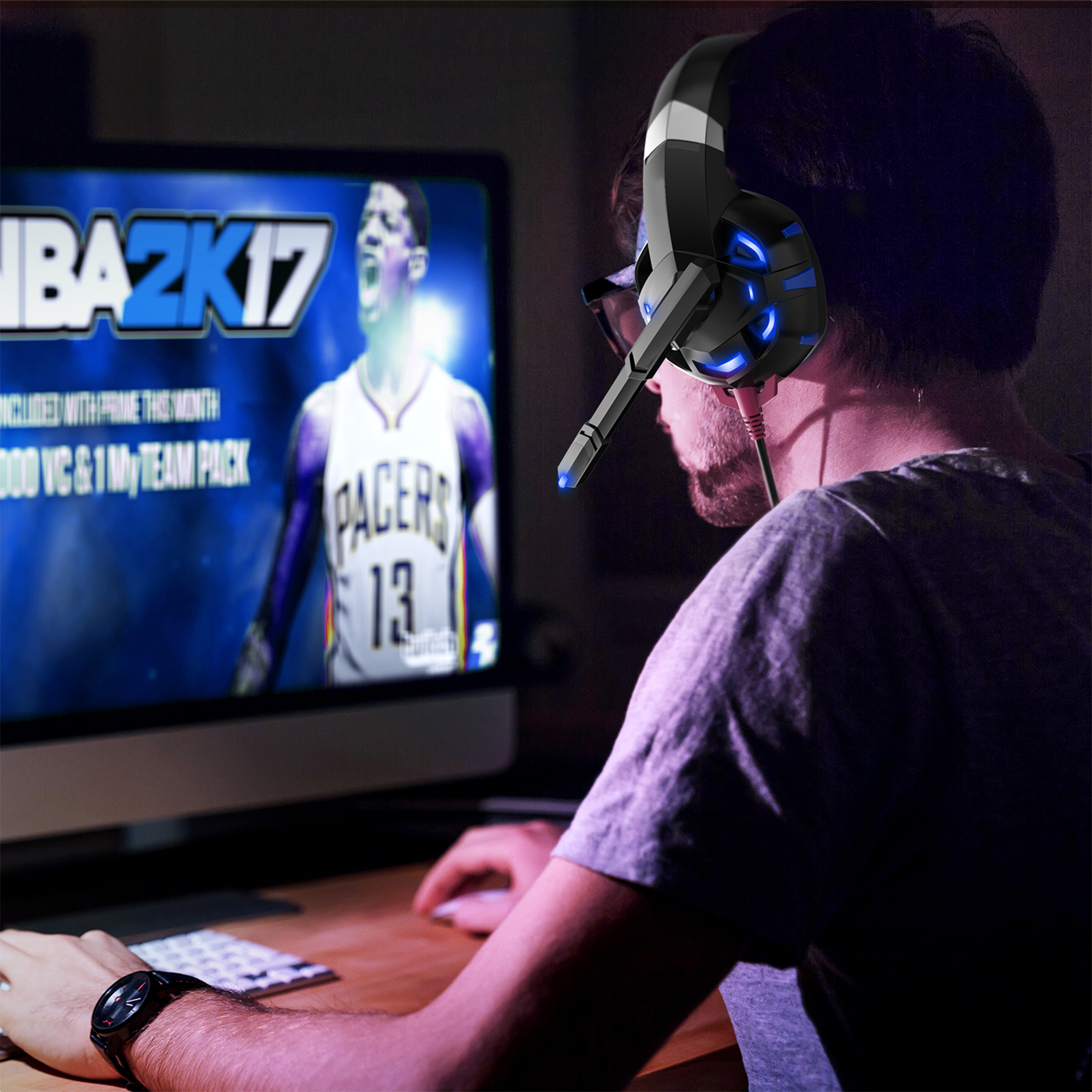 A person wearing gaming headphones is playing a game on a computer.