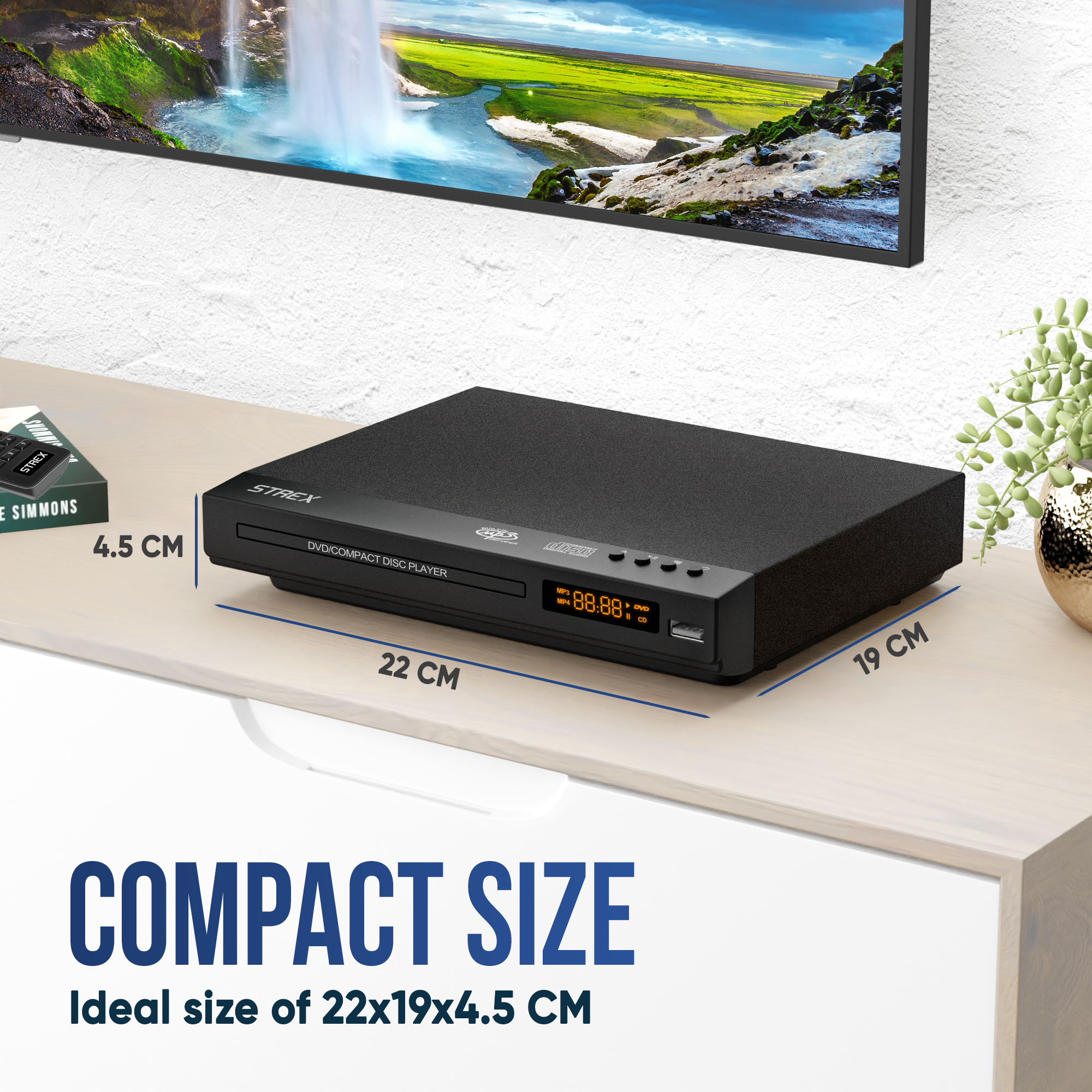 DVD player on a wooden table, next to a TV. Measurements of the player are shown, 22x19x4.5 CM. Compact size.
