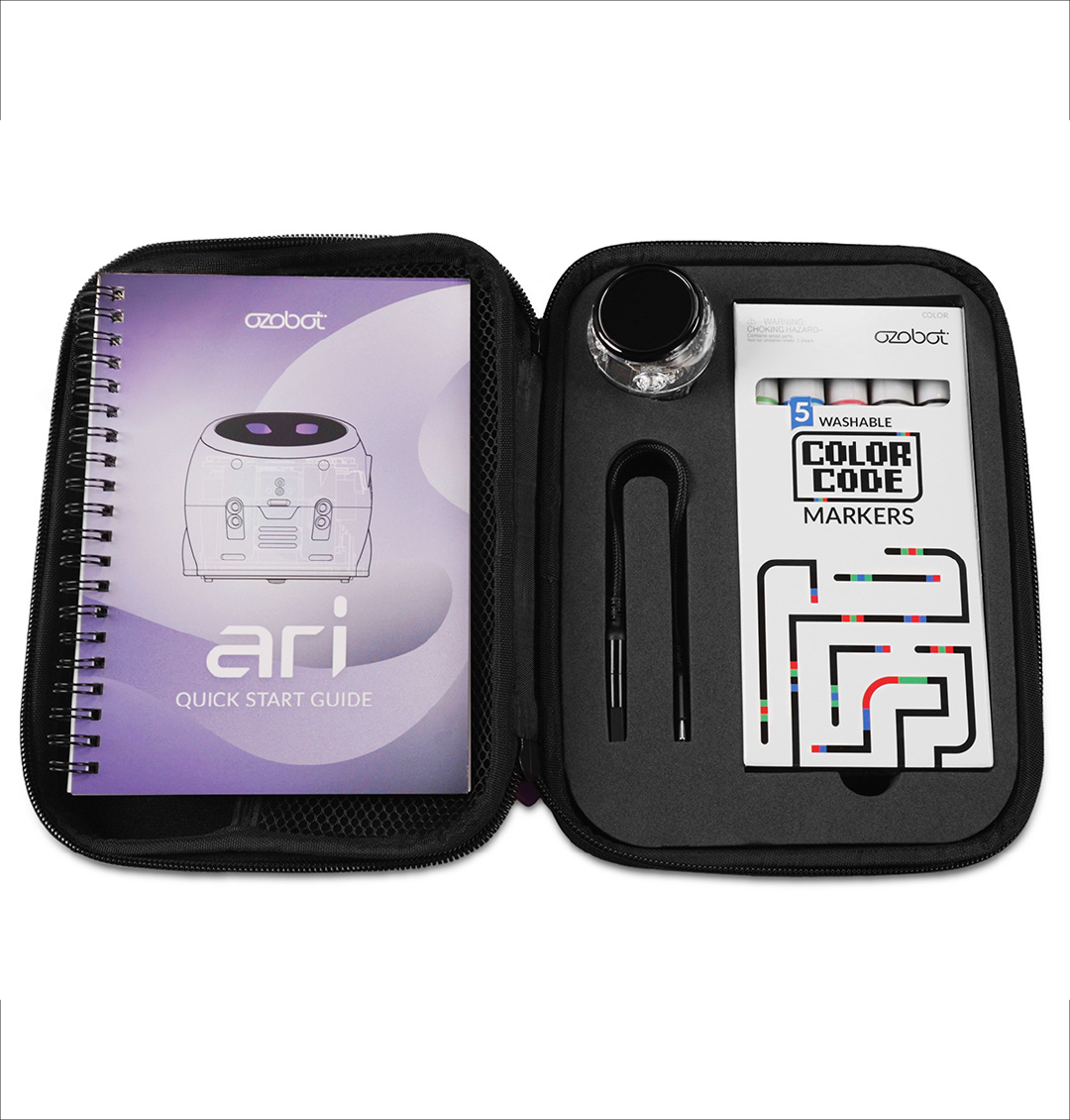 A black zipped case is open, showing a guide, markers, and tools.