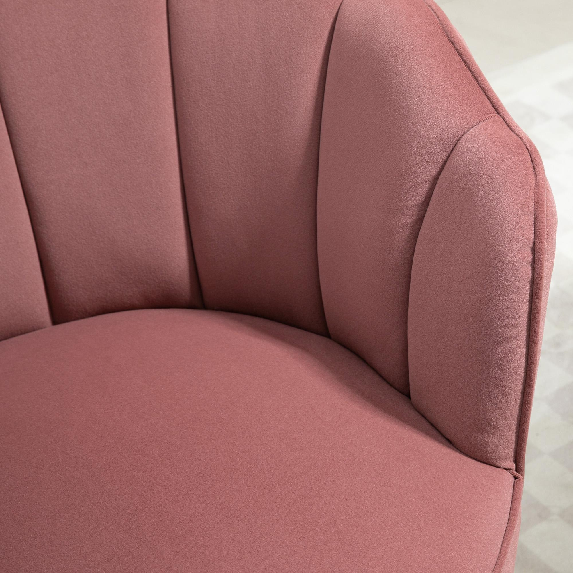 Nahaufnahme des rosa, wellenförmigen Rückens eines Stuhls. Das Material wirkt weich und samtig.