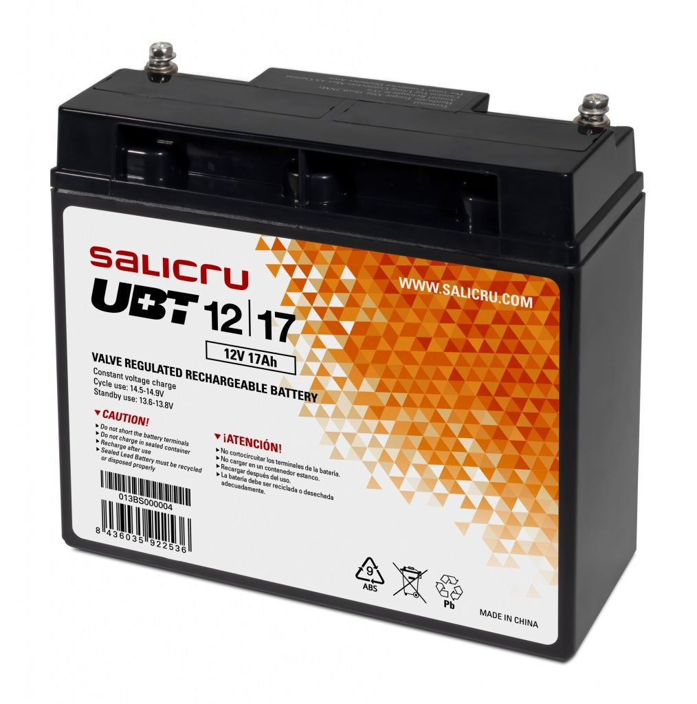 Una batería recargable Salicru UBT 12/17 rectangular negra con texto y advertencias sobre fondo blanco.