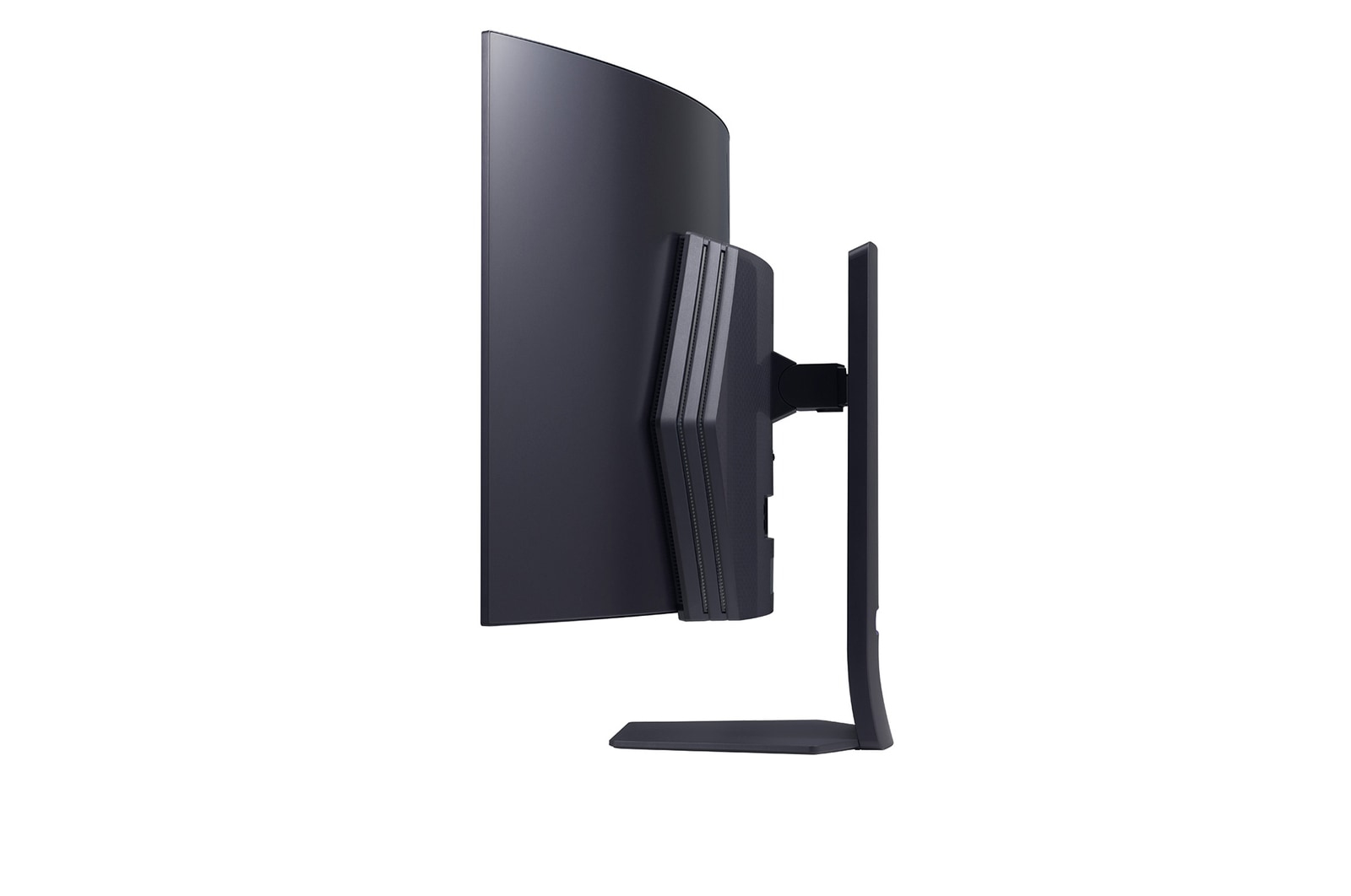 Widok z boku czarnego zakrzywionego monitora. Podstawa jest przymocowana do monitora.
