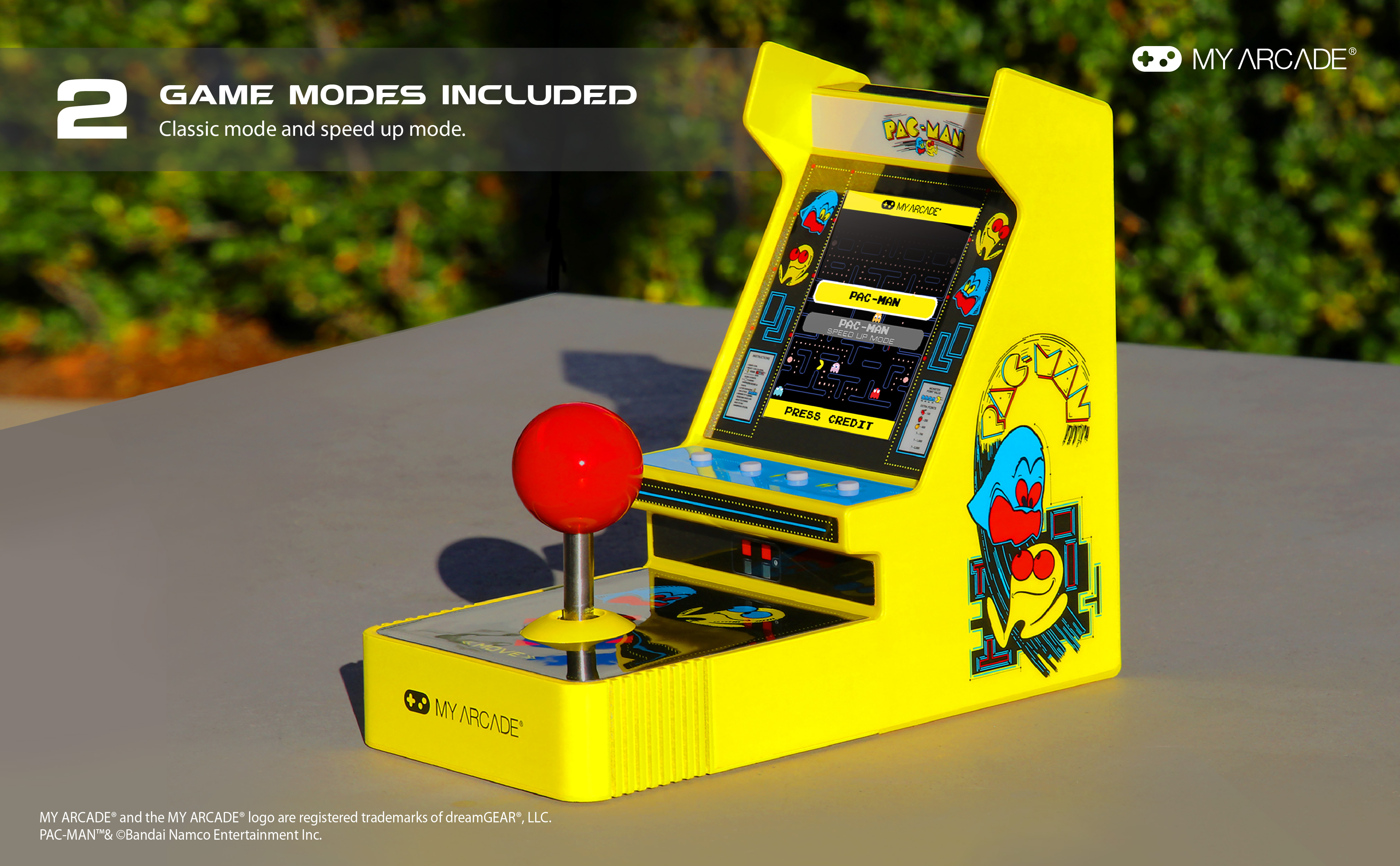 Gelbes Pac-Man-Arcade-Spiel mit rotem Joystick. My Arcade Branding ist sichtbar.