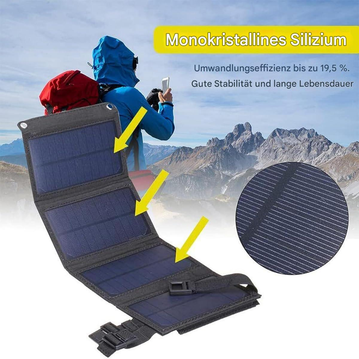Eine Person in blauer Jacke benutzt ein Telefon neben einem Solarpanel. Berge im Hintergrund.