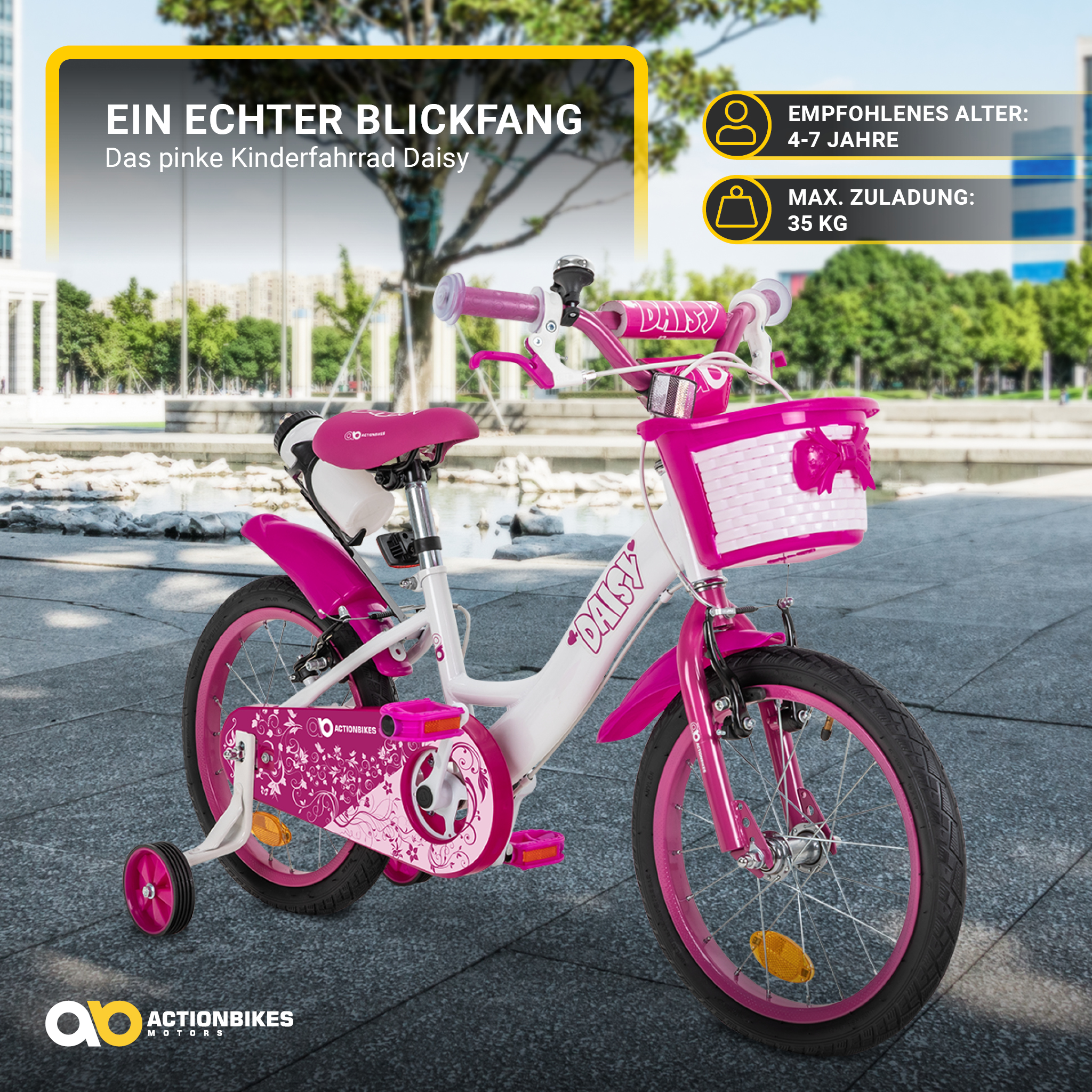 Rosa-weißes Kinderfahrrad mit Stützrädern, vor einem Hintergrund von Gebäuden.