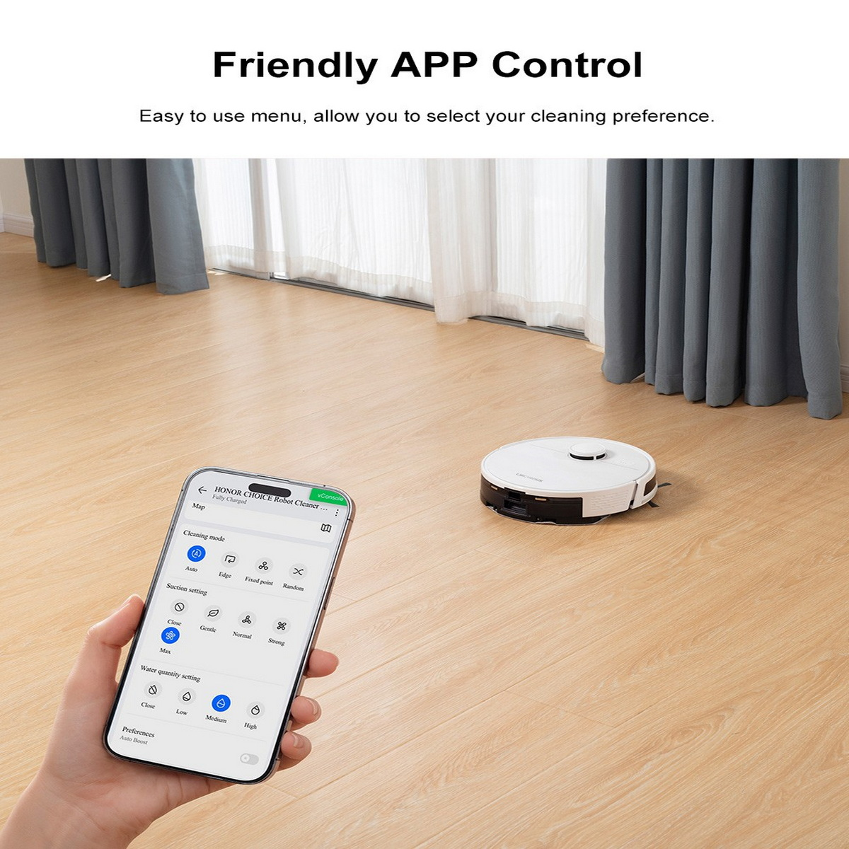 Osoba używająca telefonu do sterowania robotem sprzątającym. Robot jest na drewnianej podłodze.