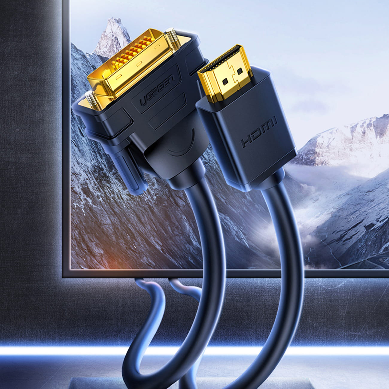 Kabel UGREEN DVI do HDMI. Złącza są złote, a kabel czarny. Przed monitorem.