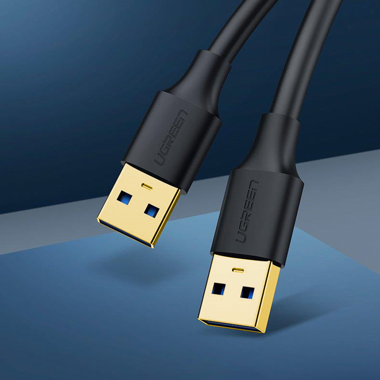 Dwa czarne kable USB ze złotymi złączami. Kable mają logo UGREEN.