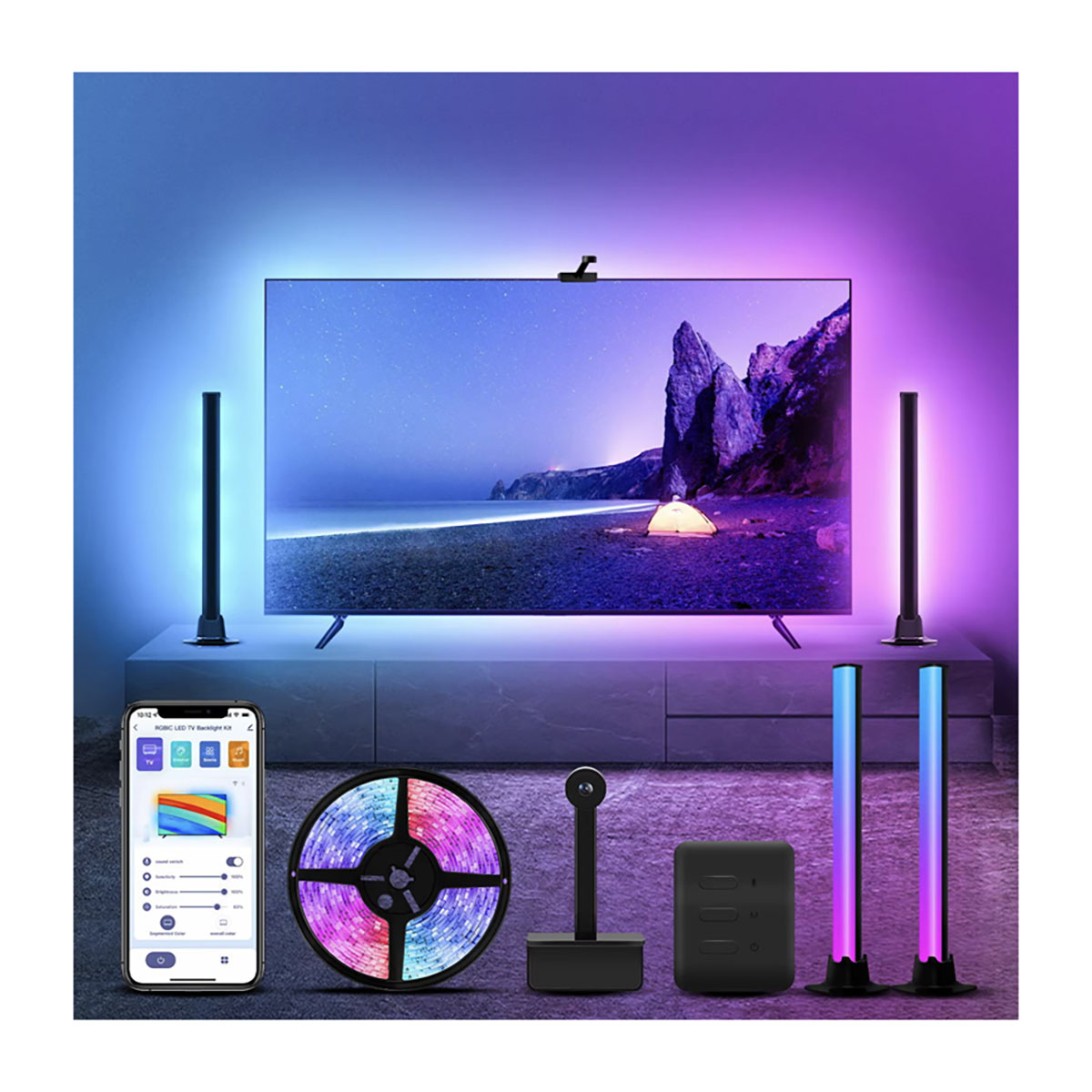 TV con tiras LED de colores. El conjunto tiene un mando a distancia y otros elementos. La escena es oscura.
